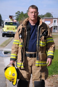 Firefighter Nick Servon joined the firefighting community when he was 15-years-old, intrigued by the excitement of the job. Servon has been fighting fires for 20 years and is a member of the 628th Civil Engineering Squadron/Civil Engineer Fire Department at Joint Base Charleston - Weapons Station. (U.S. Navy photo/Petty Officer 1st Class Jennifer Hudson)