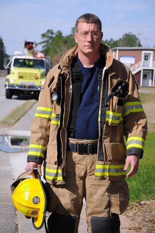 Firefighter Nick Servon joined the firefighting community when he was 15-years-old, intrigued by the excitement of the job. Servon has been fighting fires for 20 years and is a member of the 628th Civil Engineering Squadron/Civil Engineer Fire Department at Joint Base Charleston - Weapons Station. (U.S. Navy photo/Petty Officer 1st Class Jennifer Hudson)