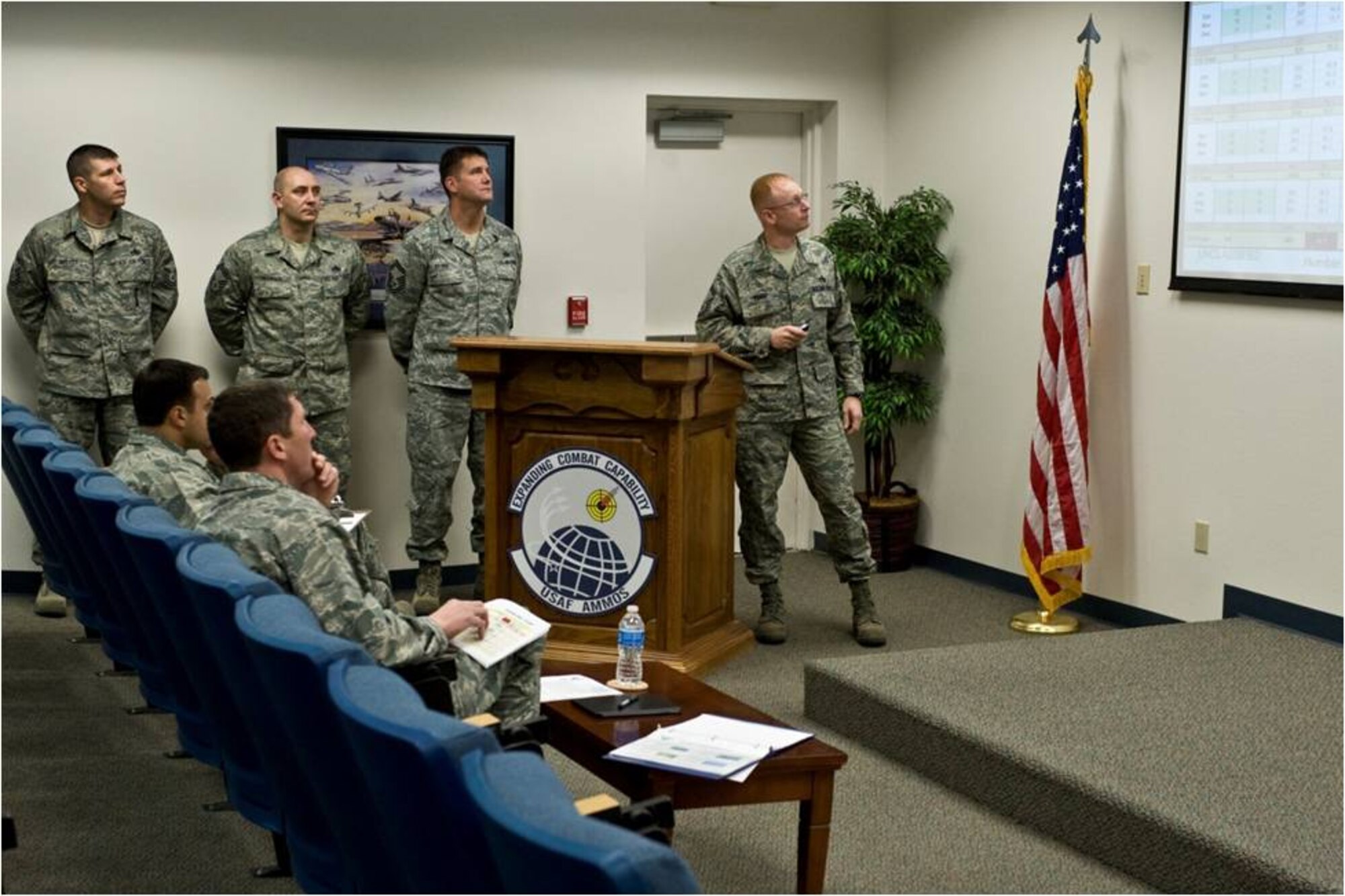 U.S. Air Force Advanced Maintenance Superintendent Course students brief Lt. Col. William Ray, 757th Aircraft Maintenance Squadron commander, about a quarterly exercise schedule for a class assignment, Jan. 20,2012, at Nellis Air Force Base, Nev. The AMSC provides a curriculum that SNCO's develop skills of leadership and expertise within their career field. (U.S. Air Force photo by Airman 1st Class Matthew Lancaster)
