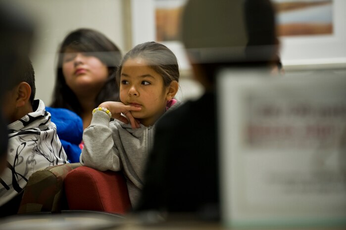 Las Vegas residents wait to receive dental work Feb. 11th, 2012 during Give Kids A Smile at the University of Nevada Las Vegas School of Dentistry. Give Kids A Smile is a national event where dental organizations, including the 99th Dental Squadron, screen and provide education to children in need of dental services. The 99th DS, Nellis Air Force Base, Nev., gives back to the community by participating in the event annually and screened approximately 200 children this year. (U.S. Air Force photo by Senior Airman Brett Clashman)