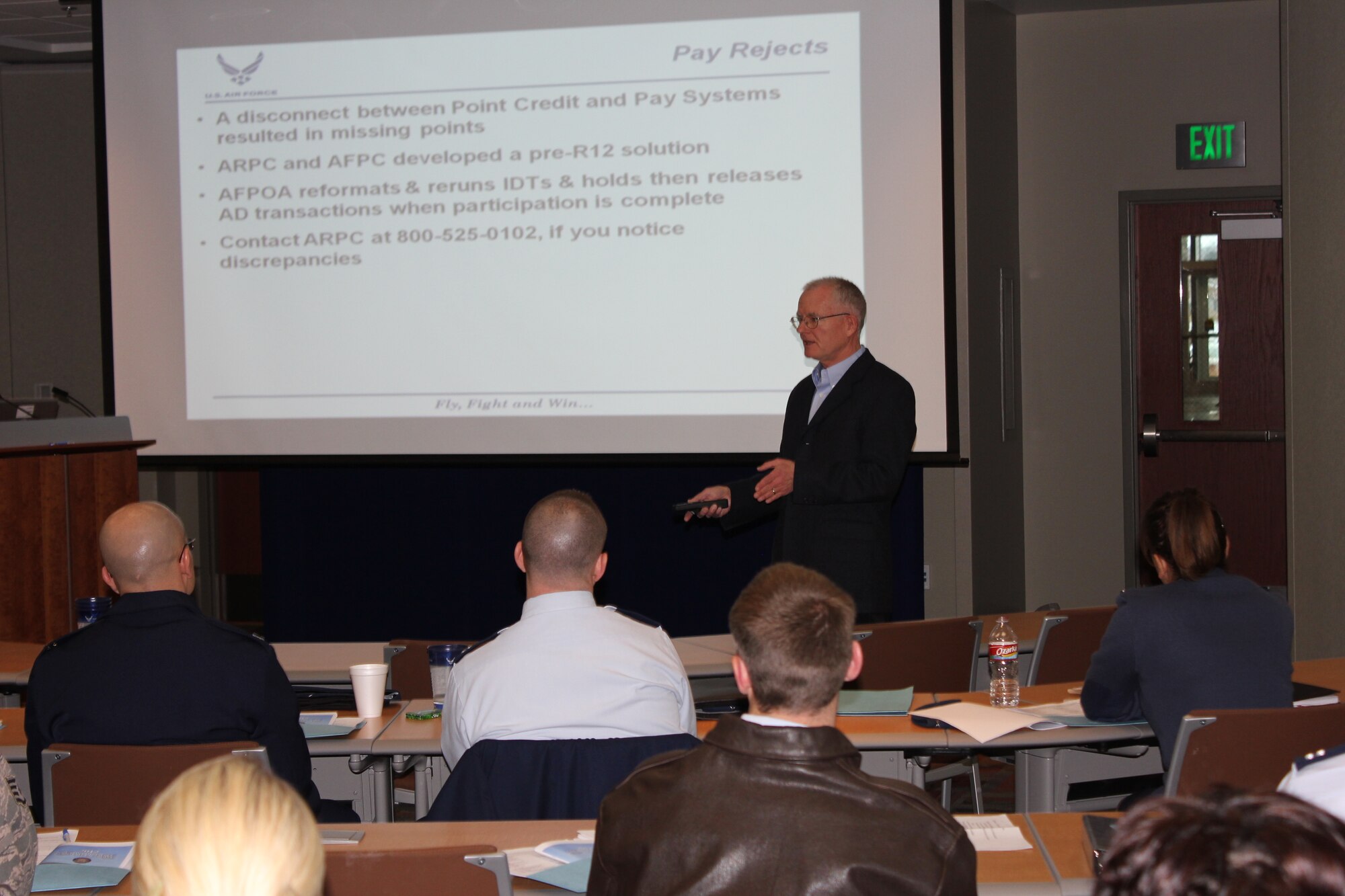 Les Brockman, Air Reserve Personnel Center points branch chief, discusses point credit and pay systems during the Air Reserve Component Field Orientation Feb. 15, 2012, on Buckley Air Force Base, Colo. The orientation offers an opportunity for ANG/Reserve field personnel, whether from state headquarters or units, to become acquainted with the services and customer support available at ARPC. Commanders and senior managers are also welcome to attend. (U.S. Air Force photo/Tech. Sgt. Rob Hazelett)