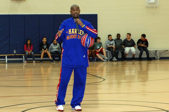 Harlem Globetrotter Shane "Scooter" Christensen  speaks to members of the Nellis community during his visit Feb. 10th, 2012 at the Youth Center, Nellis Air Force Base, Nev. The Las Vegas native is in his seventh season with the Globetrotters and has played basketball in more than 50 countries during his time on the team. (U.S. Air Force photo by Staff Sgt. Taylor Worley)