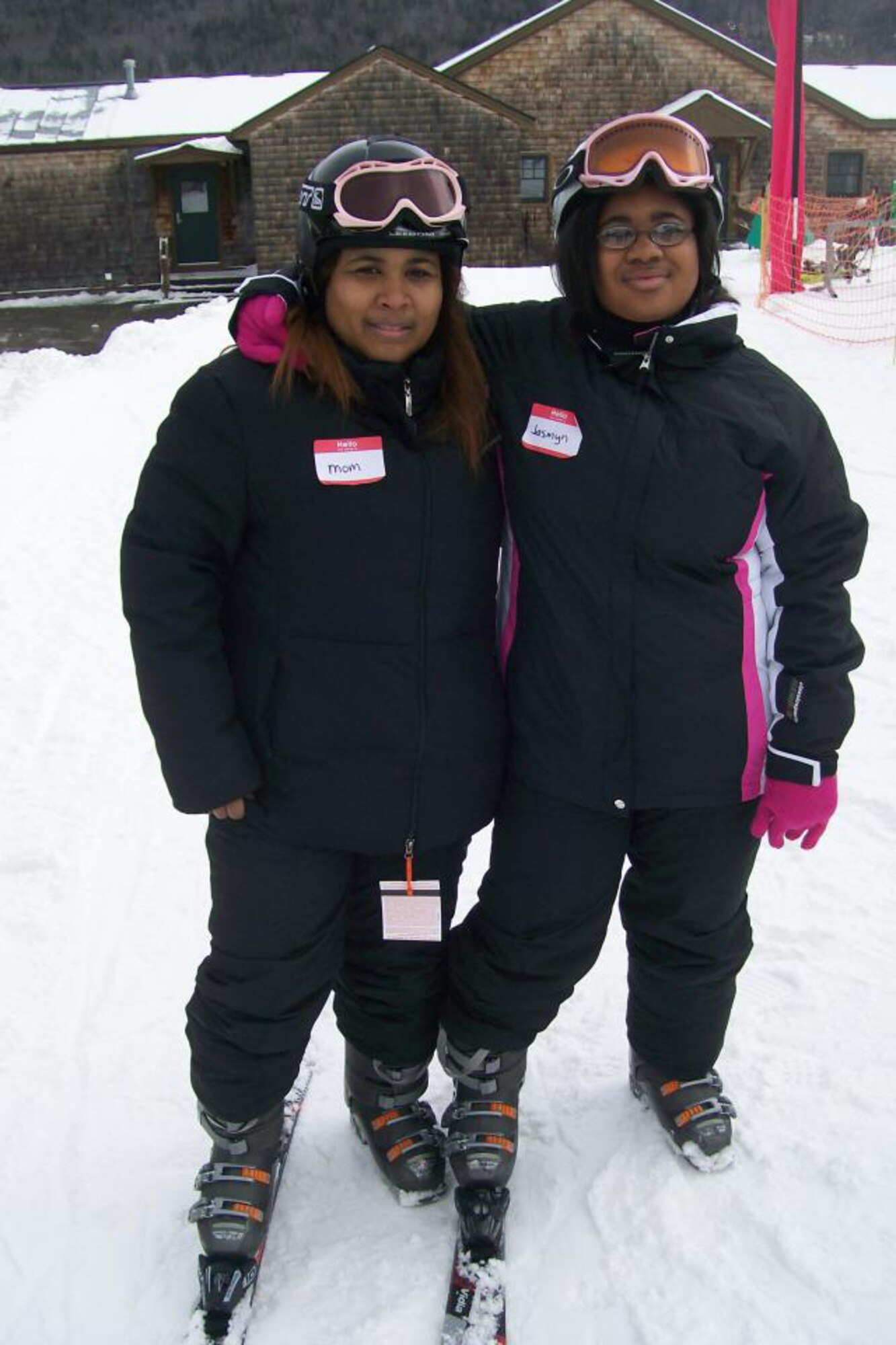 Air Force Reservist Tech. Sgt. Francine Torres (left) and her visually impaired 17-year-old daughter, Jasmine Polite (right), attended a free military-sponsored mountain adventure camp for military teens with physical disabilities in New Hampshire. Along with a dozen other kids from across the U.S., The Torres duo enjoyed many winter activities and adventures they normally wouldn't do to include dog sledding, snow tubing, ice skating and downhill skiing. Torres is an knowledge operations manager with the 920th Rescue Wing, Patrick Air Force Base, Fla. (Courtesy photo)