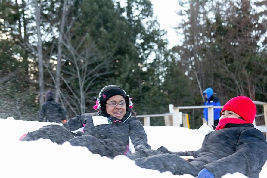 Air Force Reservist Tech. Sgt. Francine Torres (right) and her visually impaired 17-year-old daughter, Jasmine Polite, attended a free military-sponsored mountain adventure camp for military teens with physical disabilities that would change her daughter's life. Along with a dozen other kids from across the U.S., The Torres duo enjoyed many winter activities and adventures they normally wouldn't do. Torres is an knowledge operations manager with the 920th Rescue Wing, Patrick Air Force Base, Fla. (Courtesy photo)