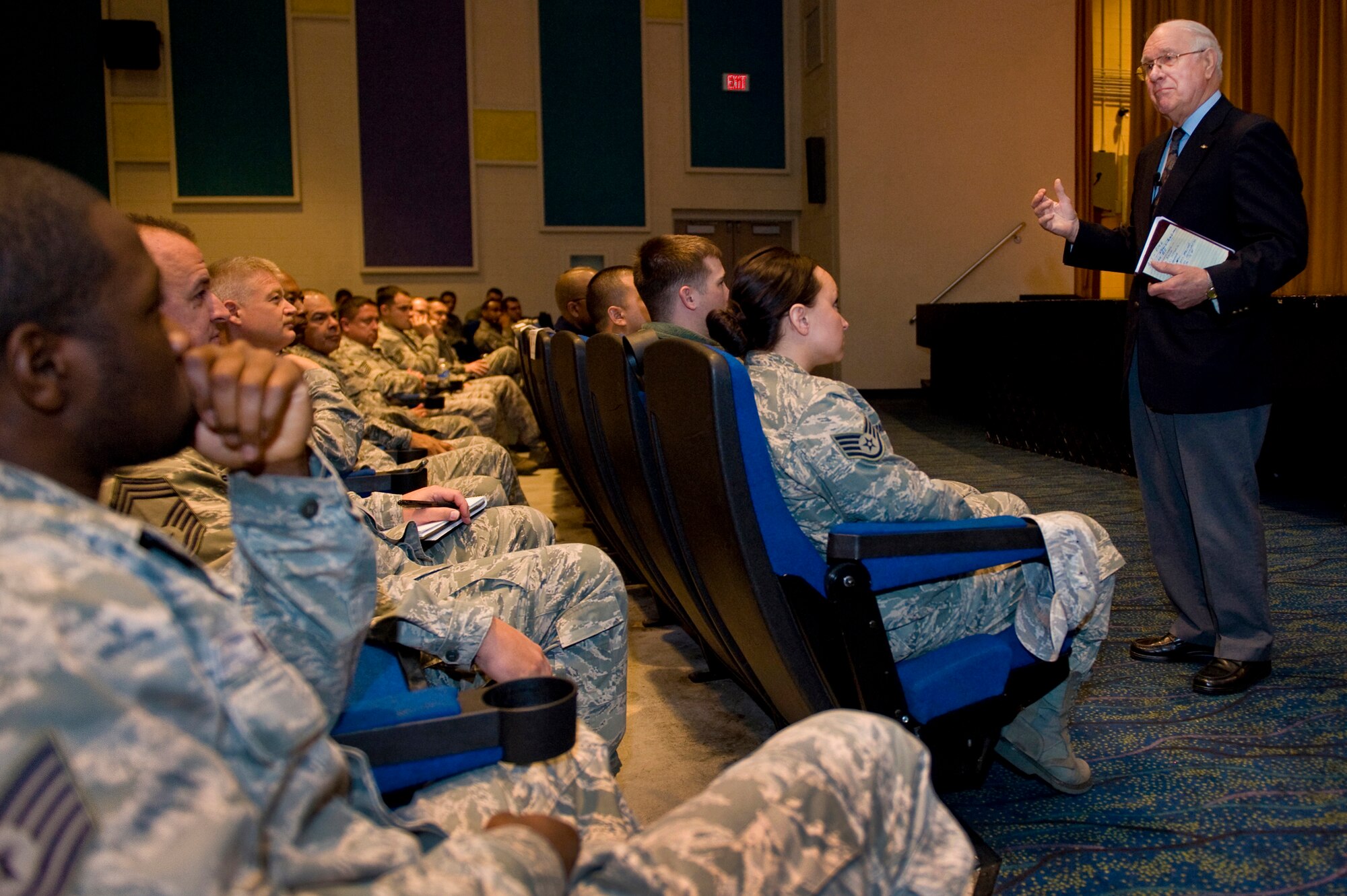 Sam Parish, 8th Chief Master Sgt. of the Air Force, speaks with enlisted Airmen, Feb. 10, 2012 at the base theater, Nellis Air Force Base, Nev. Parish discussed current Air Force events and shared knowledge he acquired over thirty-one years of military service. (U.S. Air Force photo by Staff Sgt. William P.Coleman)
