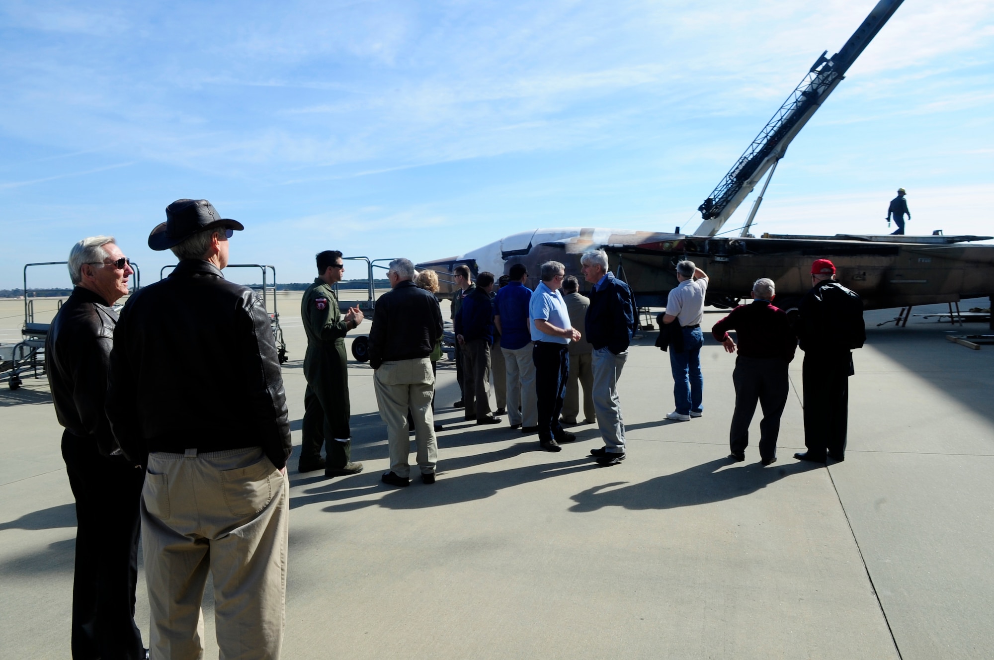 The Society of Wild Weasels view an old F-111E Aardvark at Shaw Air Force Base, S.C., Feb. 3, 2012. The Wild Weasel mission was developed by the Air Force in 1965 during the Vietnam War. (U.S. Air Force photo by Airman 1st Class Hunter Brady/Released)