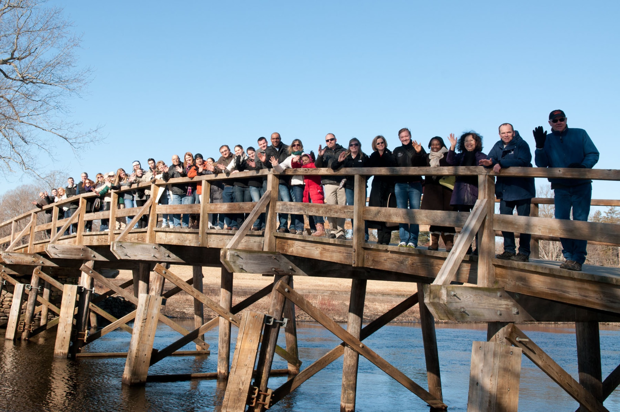 Annual award nominees from the 66th Air Base Group, along with their family and friends, line up on the North Bridge for a photo Feb. 9. The nominees enjoyed trips to several Boston-area landmarks over a two day period. Look in next week’s Hansconian for photos of the winners. (U.S. Air Force photo by Rick Berry) 