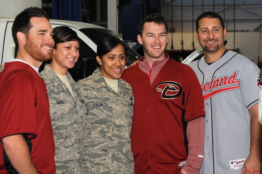 Tech. Sgt. Dianhyram Soto, of the 162nd Traffic Management Office, and Staff Sgt. Patricia Pacheco, a supply technician, smile with Arizona Diamondbacks pitcher, Ian Kennedy, Arizona Diamondbacks shortstop, Stephen Drew,  and 13-year Major League Baseball veteran, Tony Graffanino. (U.S. Air Force photo/1st Lt. Angela Walz)