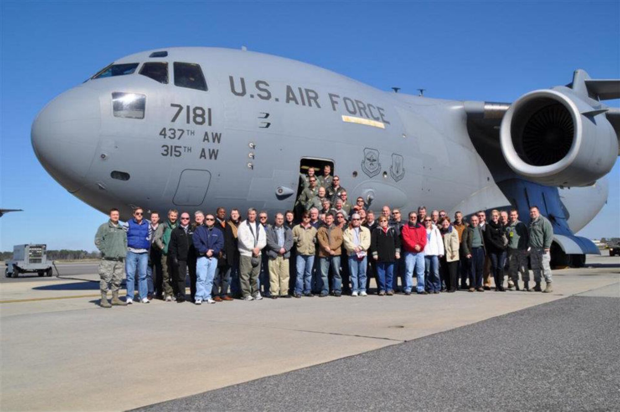 Members of the 315th Airlift Wing along with civic leaders and employers of reservists pose by a C-17 Globemaster III after a civic leader flight on Sunday Feb. 12. (U.S. Photo/Tech. Sgt. Scott Mathews)