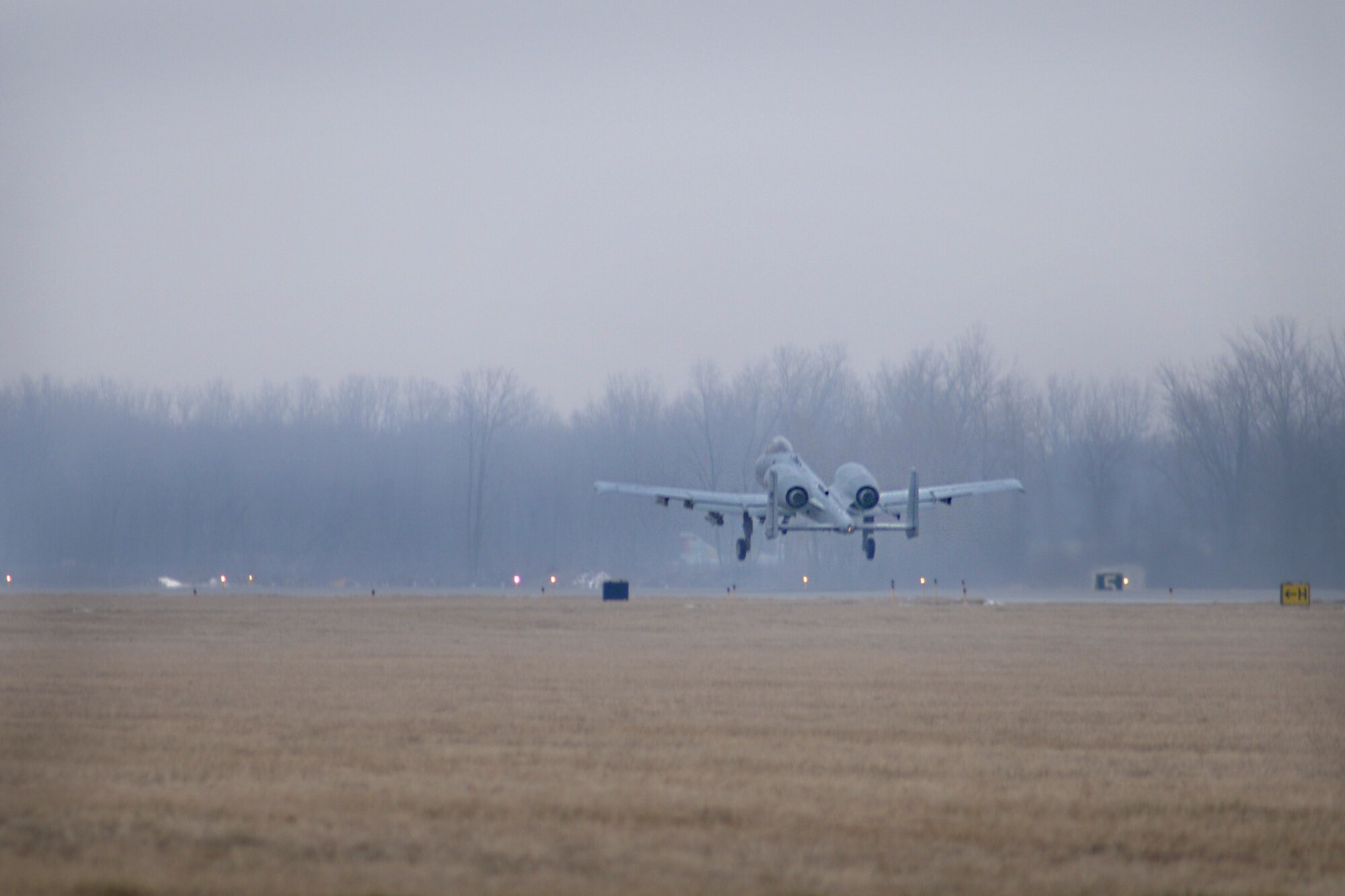 An A-10 Thunderbolt II from the 107th Fighter Squadron takes off from Selfridge Air National Guard Base, Mich., Feb. 14, 2012. The A-10 Aircraft of the 107th fighter squadron recently returned from a 4-month deployment to Afghanistan. (USAF Photo by Rachel Barton)
