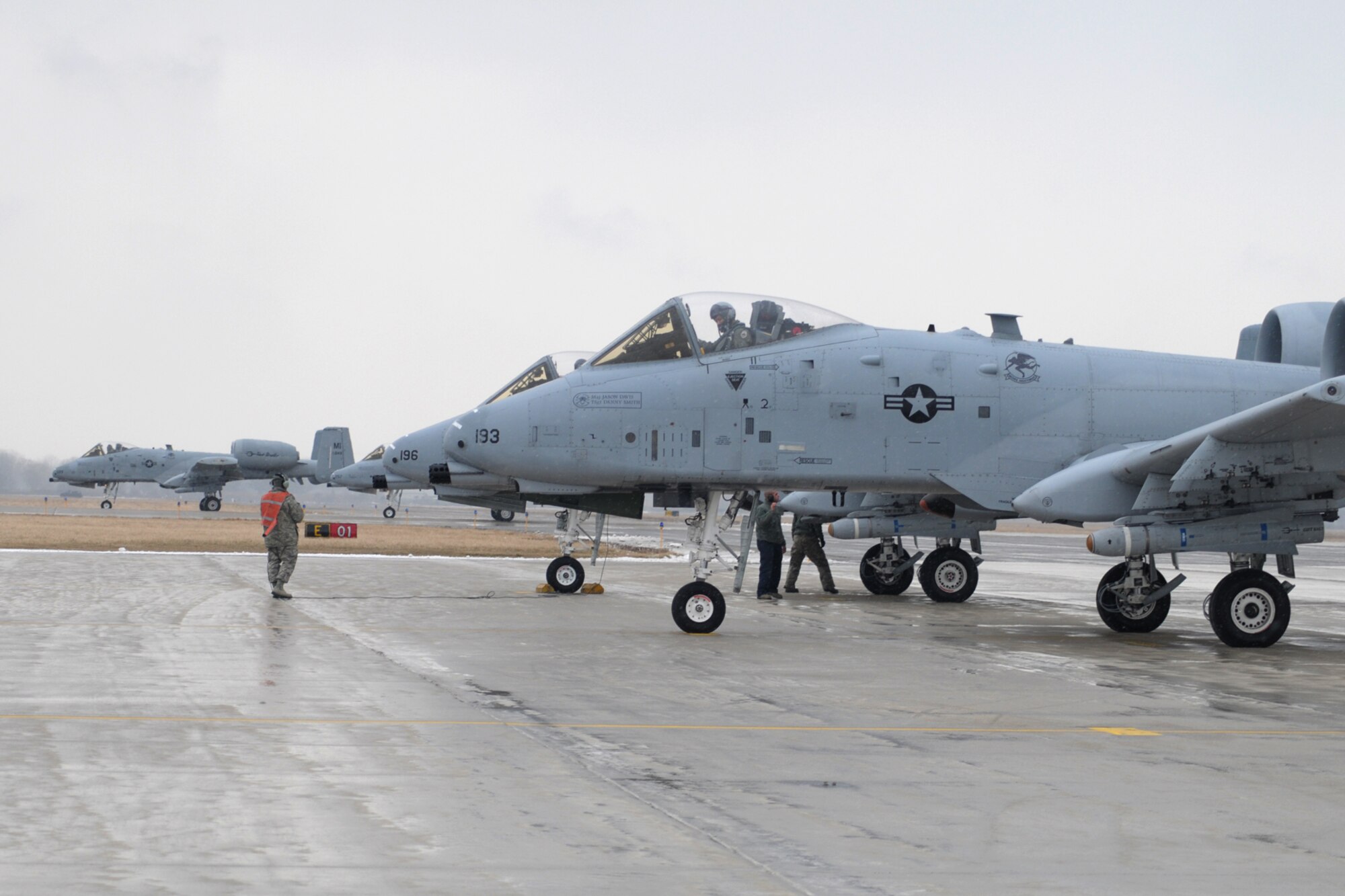 Crew chiefs with the 127th Aircraft Maintenance Squadron at Selfridge Air National Guard Base, Mich, perform final checks for A-10 Thunderbolt Ii Aircraft of the 107th Fighter Squadron on Feb. 14, 2012. The A-10 Aircraft of the 107th fighter squadron recently returned from a 4-month deployment to Afghanistan. (USAF Photo by Rachel Barton)