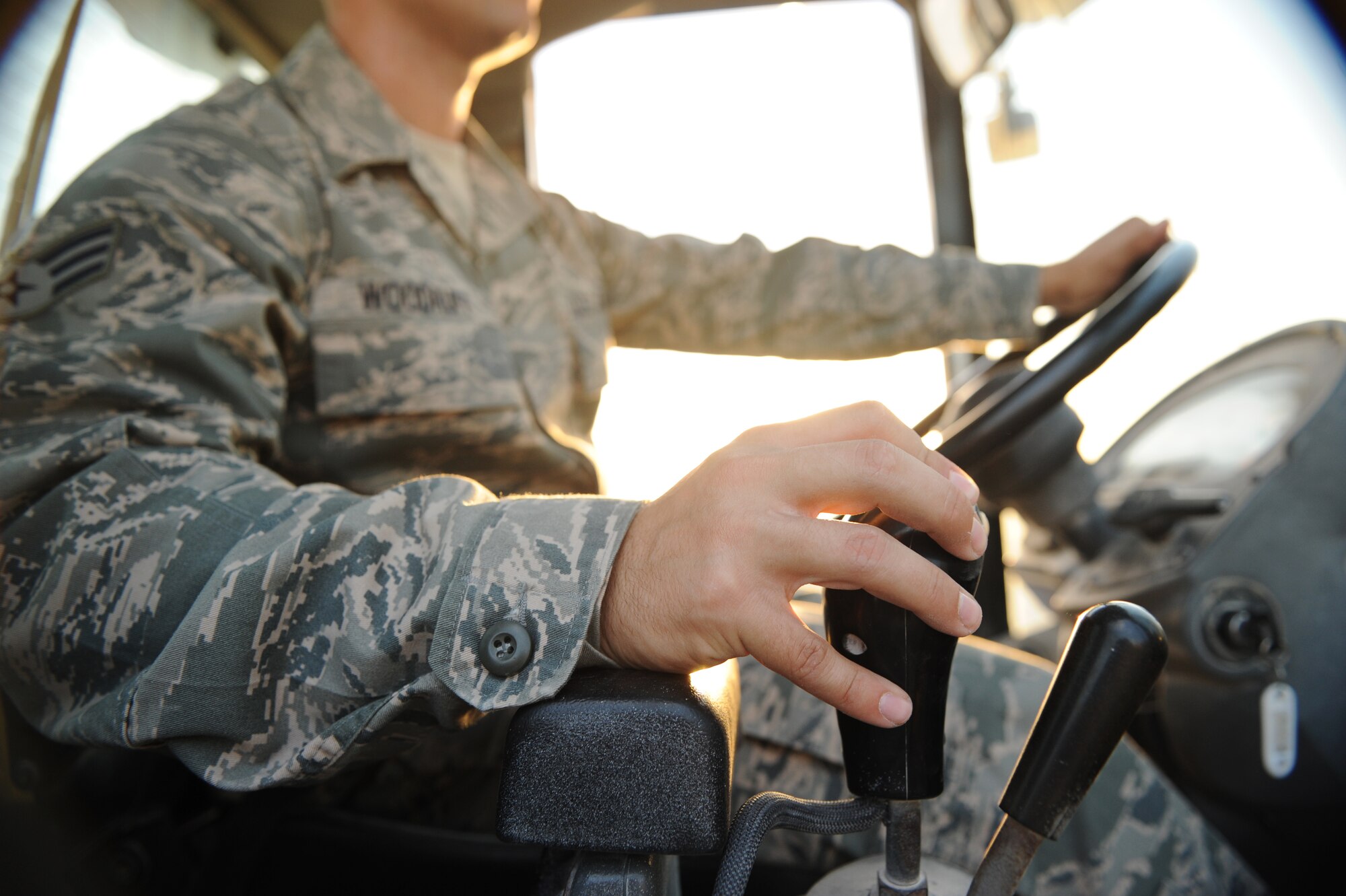 SOUTHWEST ASIA – Senior Airman Jonathan Woodruff, 8th Expeditionary Air Mobility Squadron air transportation specialist and native of Griffin, Ga., lowers the forks on a 10k adverse terrain loader to pick up a pallet here Feb. 10, 2012. The 8th EAMS is broken down into a passenger service and a Air Freight-side. Air Freight is broken down further into the cargo processing, freight services, and ramp sections. (U.S. Air Force photo/Staff Sgt. Nathanael Callon)