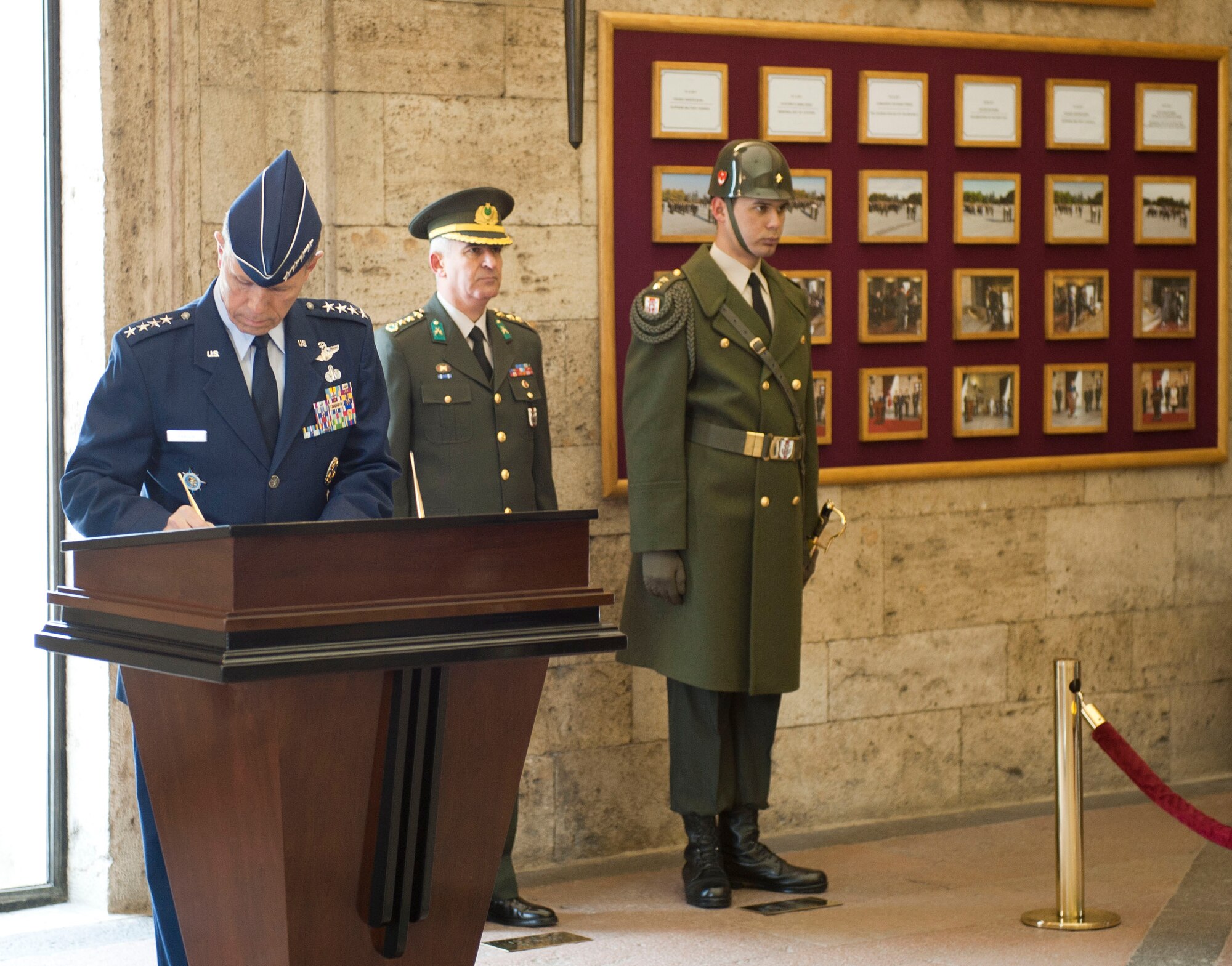 Gen. William M. Fraser III, U.S. Transportation Command commander, signs the visitors log at Mustafa Kemal Ataturk’s memorial and mausoleum following a wreath-laying ceremony Feb. 9, 2012, in Ankara, Turkey. Fraser travelled to Ankara to participate in the ceremony that honors Ataturk, the founder of the Republic of Turkey.(U.S. Air Force photo by Senior Airman Clayton Lenhardt/Released)