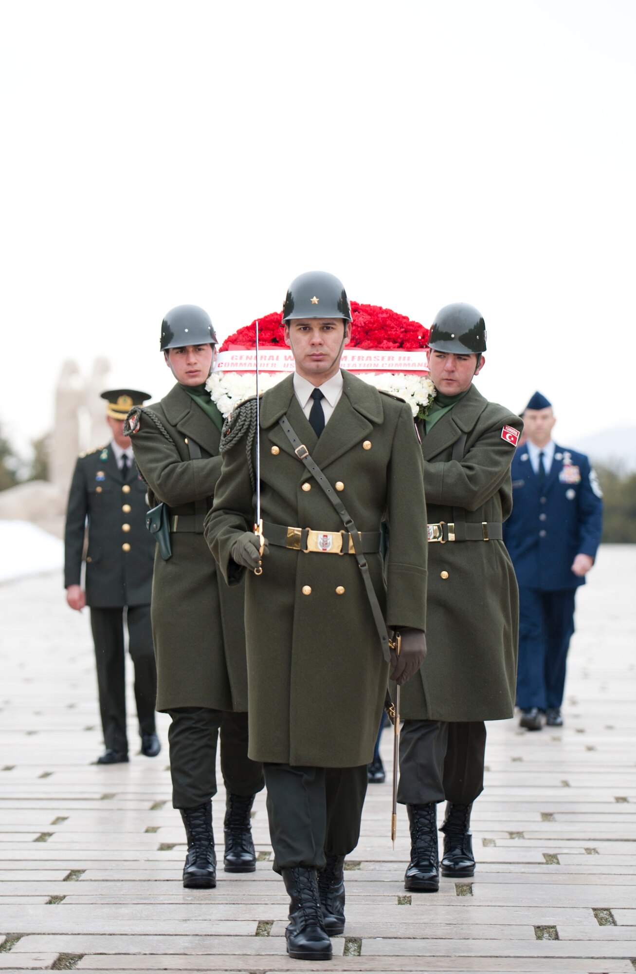 Turkish service members lead a U.S. and Turkish military procession during a wreath-laying ceremony at Mustafa Kemal Ataturk’s memorial and mausoleum Feb. 9, 2012, in Ankara, Turkey. Gen. William M. Fraser III, U.S. Transportation Command commander, travelled to Ankara to participate in the ceremony that honors Ataturk, the founder of the Republic of Turkey.(U.S. Air Force photo by Senior Airman Clayton Lenhardt/Released)