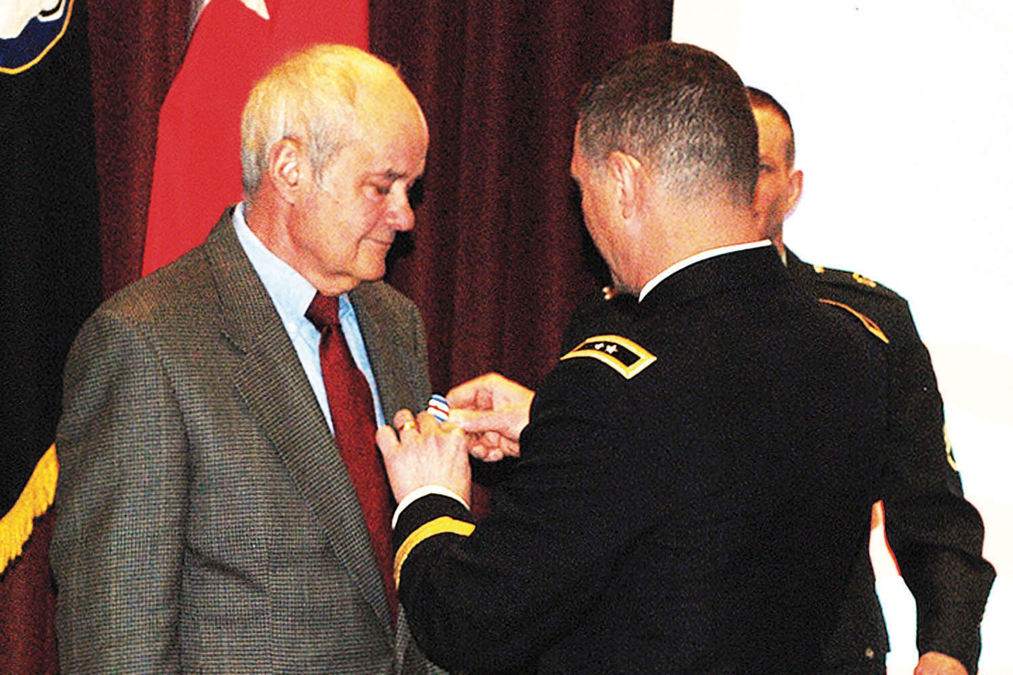 U.S. Army Alaska Commanding General Maj. Gen. Raymond P. Palumbo awards the Silver Star to Vietnam veteran Dr. Paul Taylor of Fairbanks in a Feb. 4 ceremony at Fort Wainwright. (U.S. Army photo/Staff Sgt. Trish McMurphy)