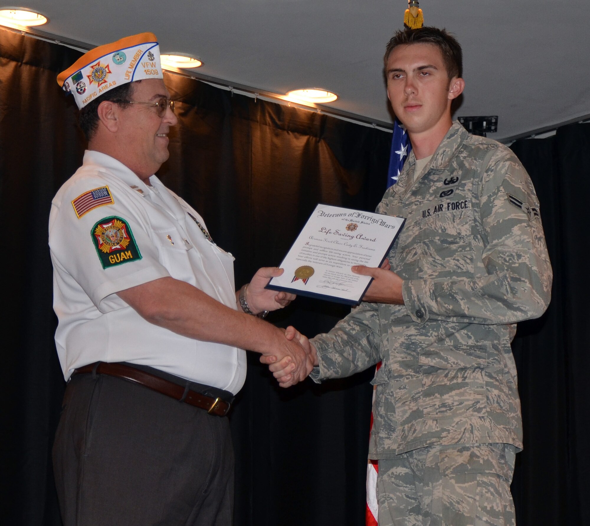 Airman 1st Class Cody Frediani was presented the Air Force Achievement Medal at the Top of the Rock here Feb. 16. Airman Frediani demonstrated expert lifesaving skills when he responded to a cry for help at the base shopette Aug. 31, 2011. Airman Frediani performed cardiopulmonary resuscitation for 15 minutes before emergency response personnel arrived on scene. (U.S. Air Force photo/Airman 1st Class Whitney Tucker)
