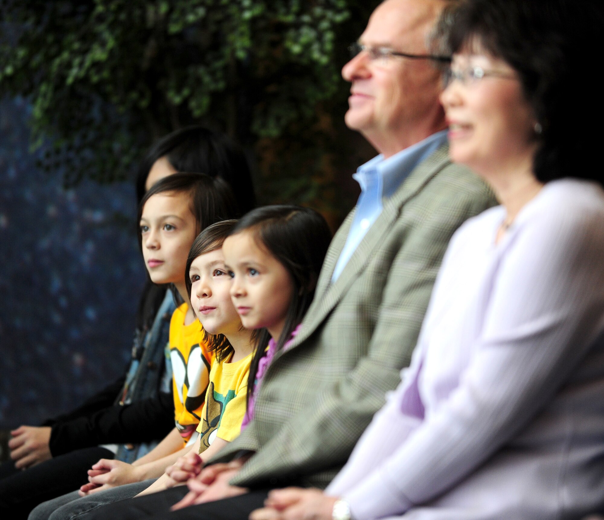 Lt. Col. Jason King's family looks on at his promotion ceremony at Schriever Air Force Base, Colo., January 12. Lt. Col. King is the Chief of The 310 OG/OGV. (U.S. Air Force photo/Tech. Sgt. Nicholas B. Ontiveros).