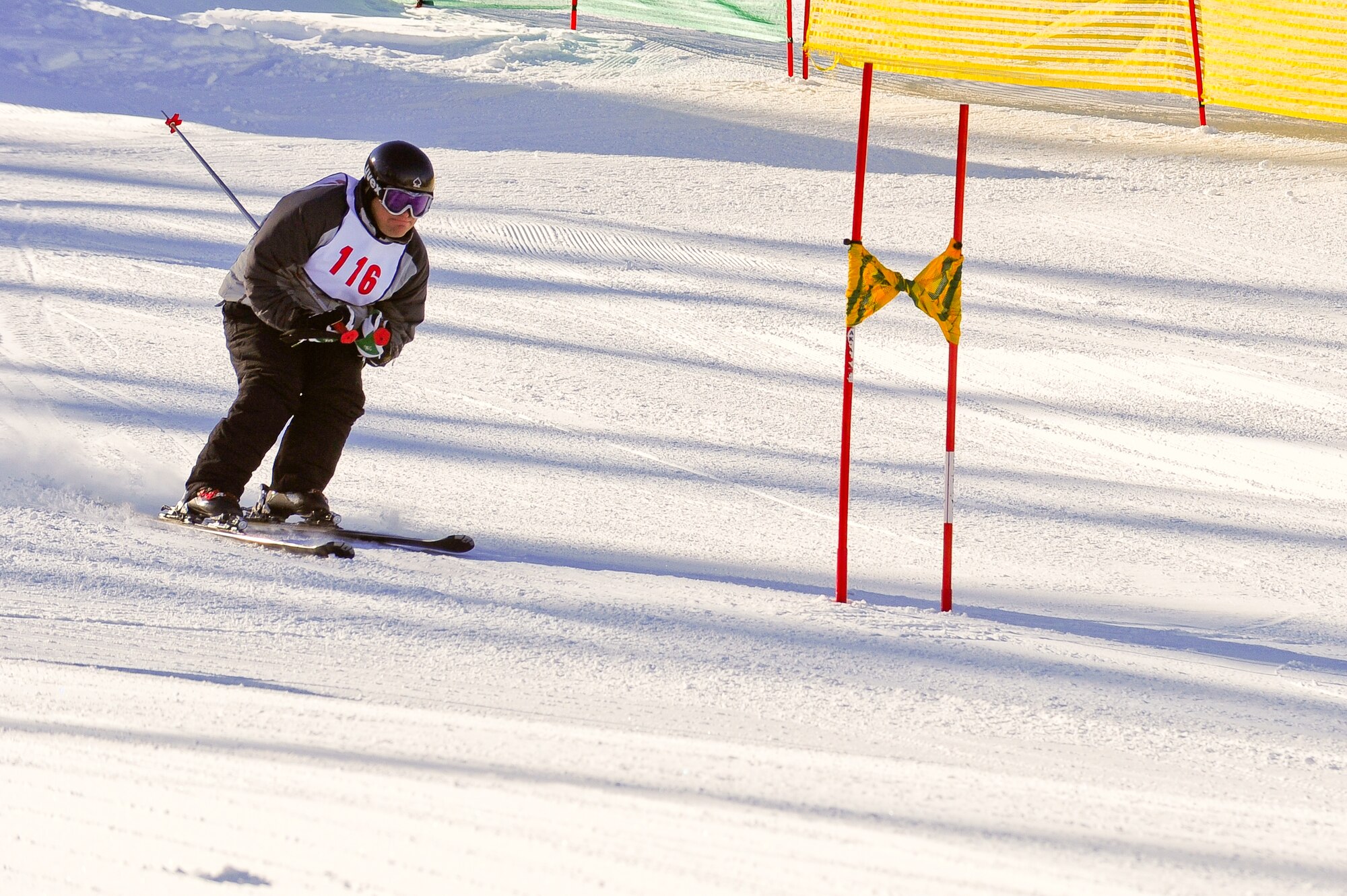 310th Space Wing member Maj. Aaron Haase, Judge Advocate, competes in a ski race during SnoFest at Keystone, Colo. on January 28. SnoFest is an annual winter event that features skiing, snowboarding, lodging, parties, giveaways, races, non skiing events and much more, all at discounted prices for the military community (including active duty, DoD civilians, family members and retirees). The event is put on by the USAF Academy Colo., Peterson AFB Colo., F.E. Warren AFB Wyo., HQ Air Force Space Command, Schriever AFB Colo., Buckley AFB Colo. and Ft. Carson Colo. (U.S. Air Force photo/Tech. Sgt. Nicholas B. Ontiveros).