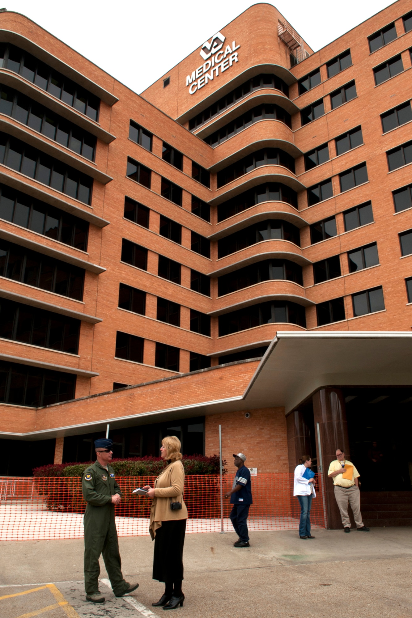 U.S. Air Force Col. Jonathan Ellis, 307th Bomb Wing commander, talks with Sandy Franks, Veterans Administration public affairs officer, outside of the Overton Brooks VA Medical Center, Shreveport, La., Feb. 15, 2012. Overton Brooks hosted commanders of the 307th Bomb Wing and 917th Fighter Group for an orientation and tour of the medical center. (U.S. Air Force photo by Master Sgt. Greg Steele/Released)