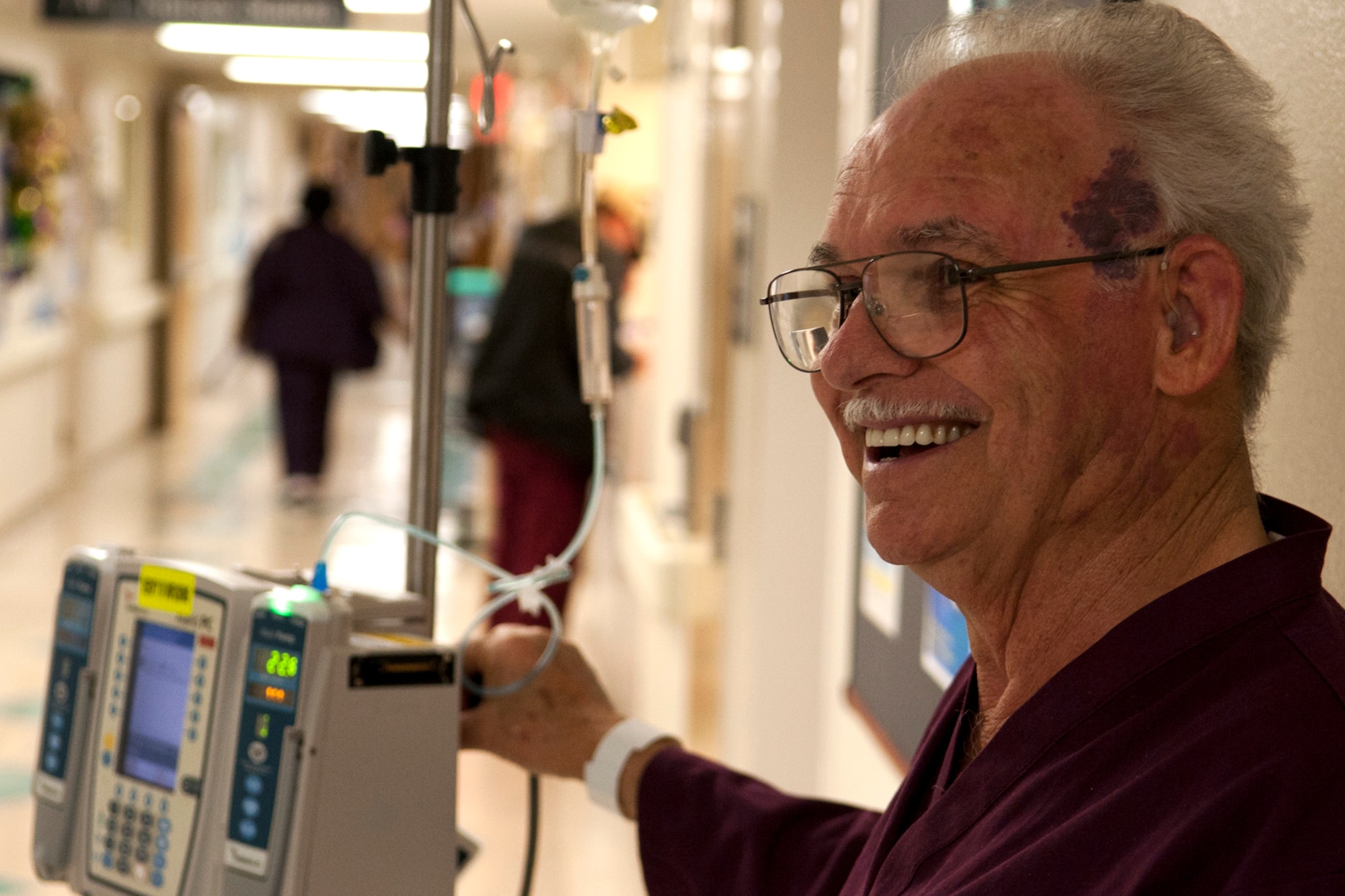 Bill Phillips gets his daily exercise by walking the halls of the Overton Brooks Veterans Administration Medical Center, Shreveport, La., Feb. 15, 2012. Phillips, stationed at Barksdale Air Force Base, La., in 1966, is a former B-52 armament and electrical technician. (U.S. Air Force photo by Master Sgt. Greg Steele/Released)