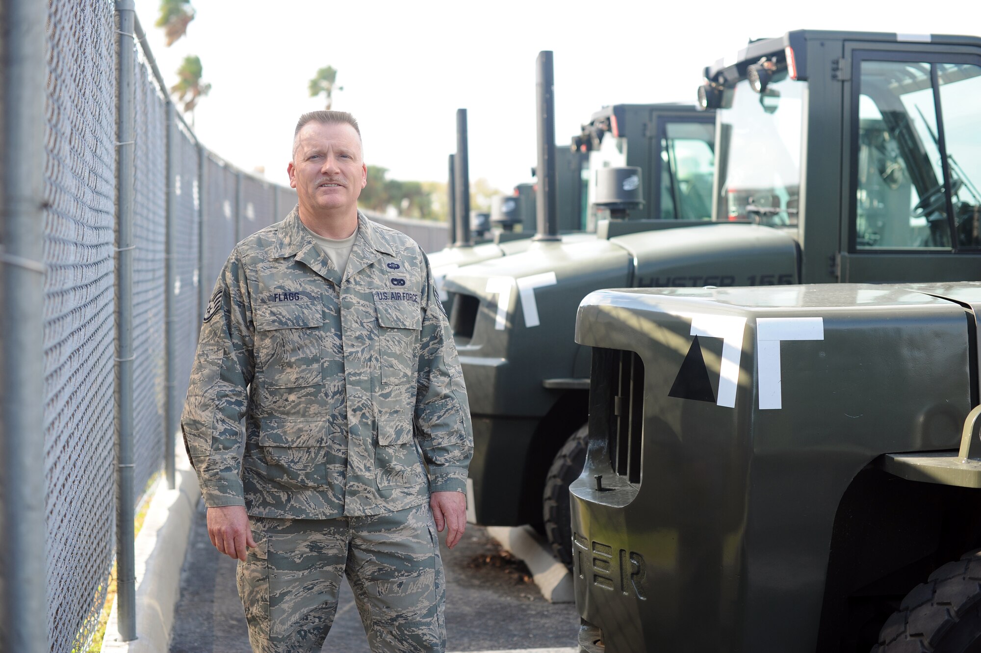 MACDILL AIR FORCE BASE, Fla. --  Staff Sgt. Paul Flagg, 927th Logistics Readiness Sqaudron, stands at the MacDill AFB Vehicle Pool where he works as a traditional reservist.  Sergeant Flagg is preparing for a deployment to Asia.  (Official U.S. Air Force photo by Staff Sgt. Jennie Chamberlin)
