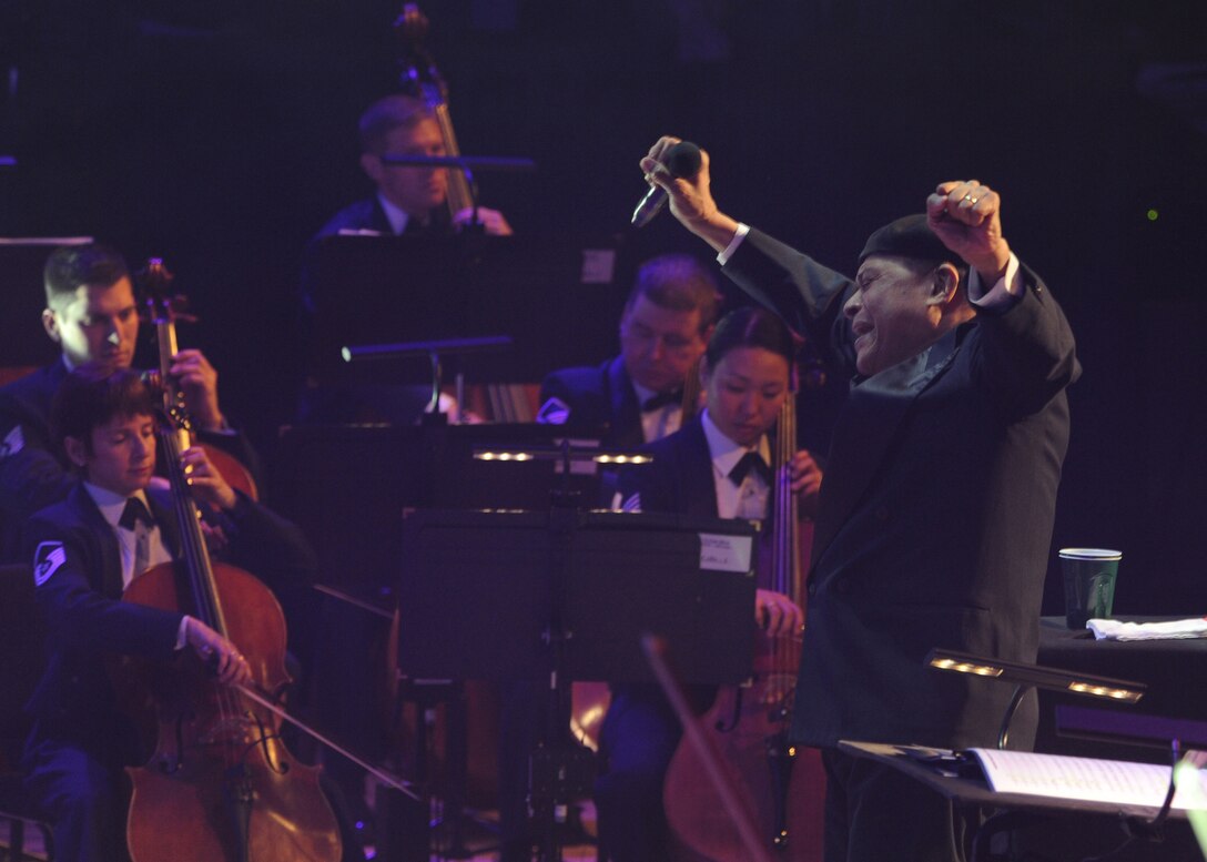 The United States Air Force Band and seven-time Al Jarreau perform one of his hit singles “Spain” during the band’s Guest Artist Series at the Daughters of the American Revolution Constitution Hall in Washington, D.C., Feb. 12. (U.S. Air Force photo\Staff Sgt. Matt Coleman-Foster)