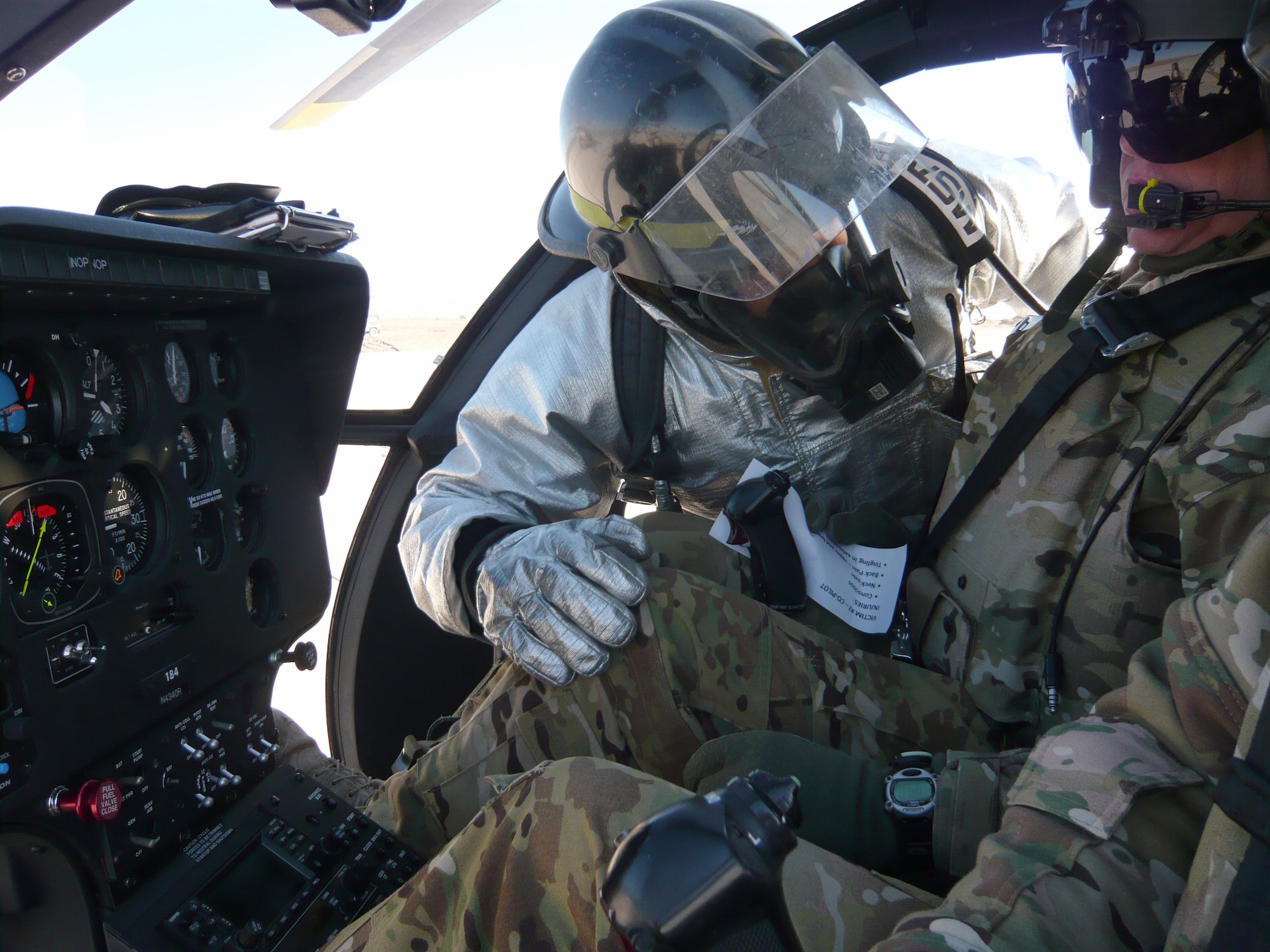 An emergency responder assesses a simulated victim during an aircraft mishap response exercise at the base Feb. 12, 2012. (Courtesy photo)