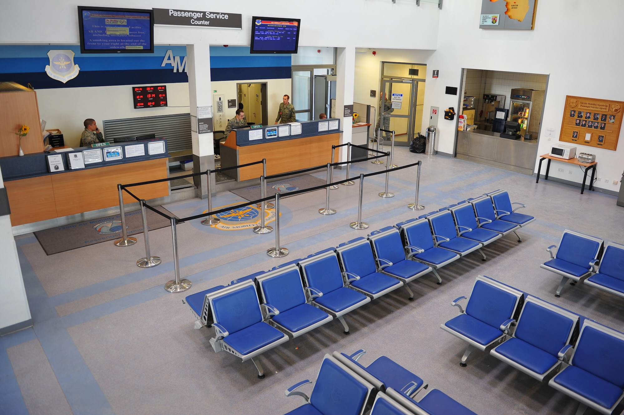 SPANGDAHLEM AIR BASE, Germany – Airmen assigned to the 726th Air Mobility Squadron prepare for incoming and outgoing flights at the passenger service counter at the passenger terminal building here Feb. 10. The 726th AMS employs more than 100 Airmen to complete its three primary missions of aerial port, command and control, and maintenance. These missions are essential to executing the mobilization of service members and cargo in support of operations in Europe and bases in U.S. Central Command. (U.S. Air Force photo by Airman 1st Class Dillon Davis/Released)