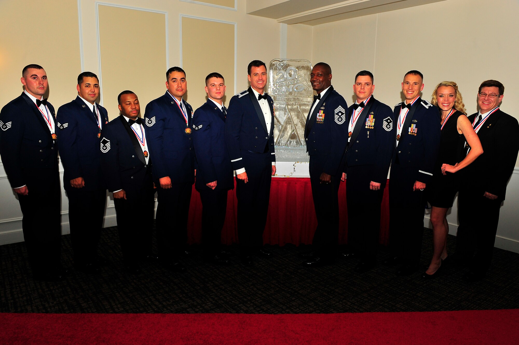 Col. Charles Moore, 20th Fighter Wing commander, (center left) and Chief Master Sgt. Lefford Fate, 20th Fighter Wing command chief, (center right), pose for a photo with the 20th FW annual award winners for 2011. The winners will now go forward to compete at the 9th Air Force level. (U.S. Air Force photo by Senior Airman Kenny Holston/Released)  


