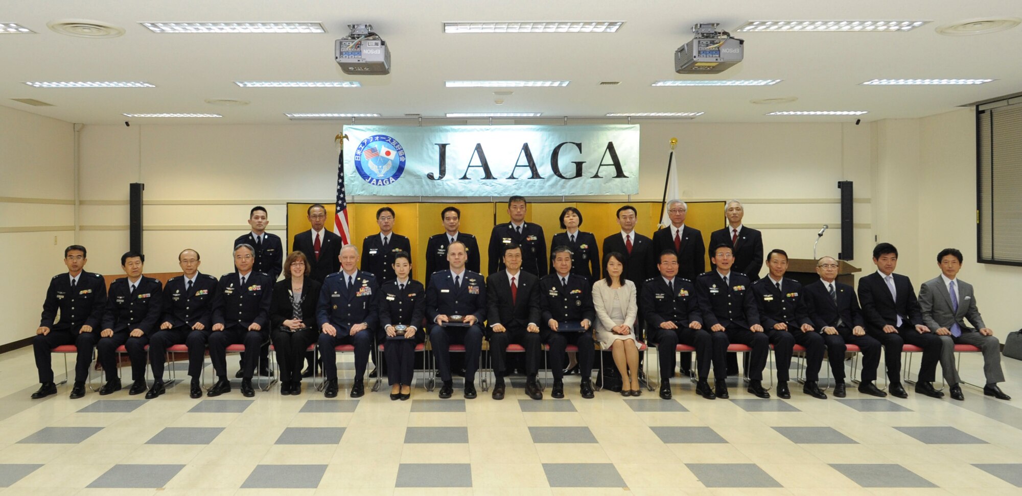 IRUMA AIR BASE, Japan -- The Japan-America Air Force Goodwill Association poses for a group photo with Yokota Air Base leadership Feb. 10, 2012, at Iruma Air Base, Japan. The goal of the association is to foster mutual understanding and friendship between Japan and the United States forces. (U.S. Air Force photo/Airman 1st Class John D. Partlow)