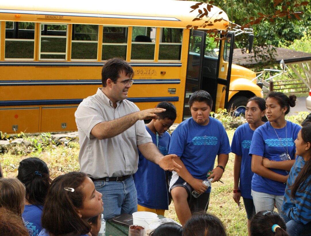 Honolulu District's Mike Wong speaks to Anuenue School students Sept. 22 as part of Oahu’s annual World Water Monitoring Day activities in the Makiki watershed. 