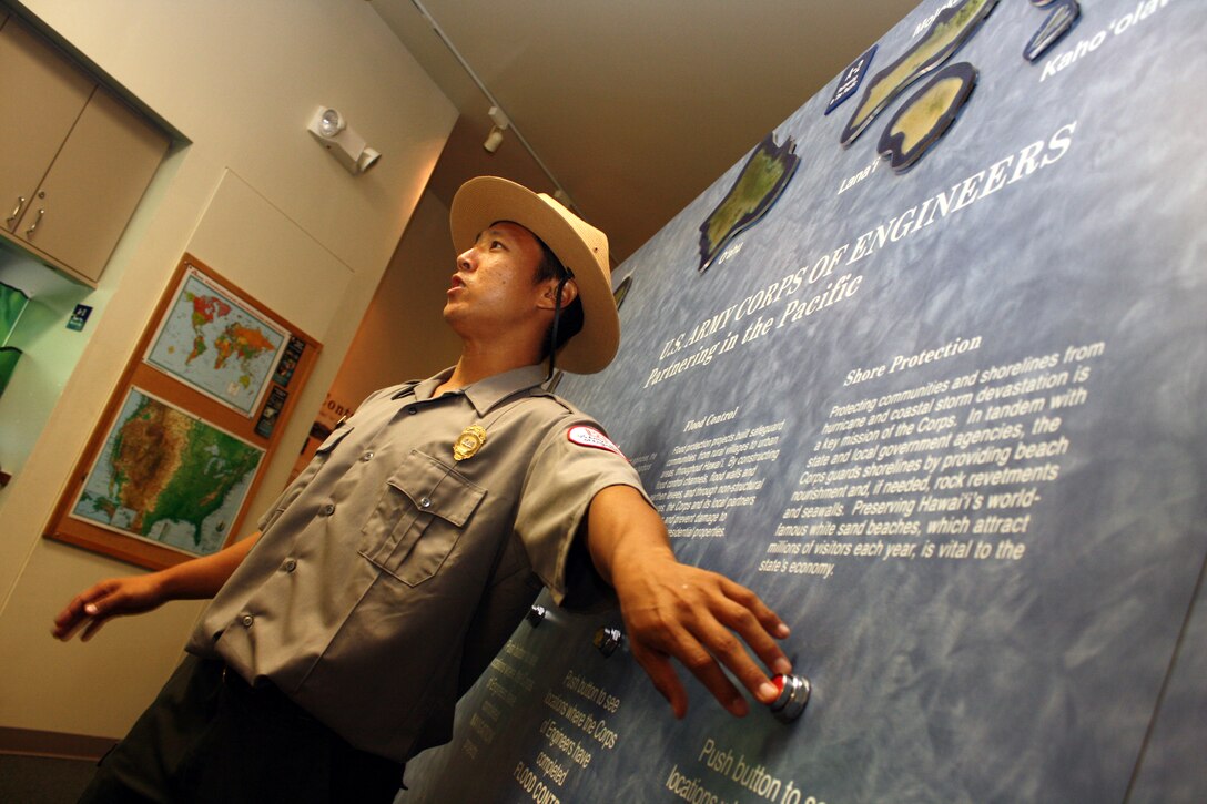 Park Ranger Corey Yamashita gives a tour to visiting Punahou High School Junior ROTC at the Honolulu District Pacific Regional Visitor Center at Fort DeRussy in Waikiki on Wednesday, October 5, 2011.