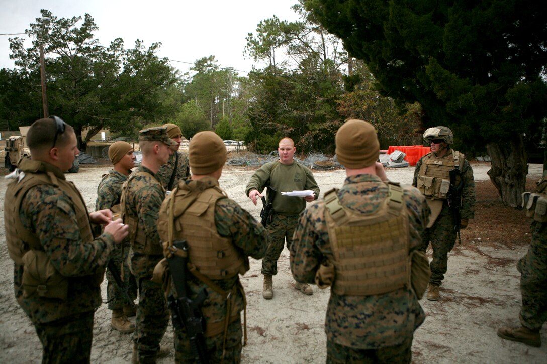 Sgt. Luke A. Willis, a bulk fuel specialist with 8th Engineer Support Battalion, 2nd Marine Logistics Group, briefs Marines and sailors prior to departing on a convoy exercise as part of a Convoy Leaders Course aboard Camp Lejeune, N.C., Jan. 11, 2012. The Battle Skills Training School offers this training exercise in order to prepare units for upcoming deployments.  The class helps train Marines and sailors to be effective in convoy operations overseas where this knowledge can mean the difference between a successful and unsuccessful mission.