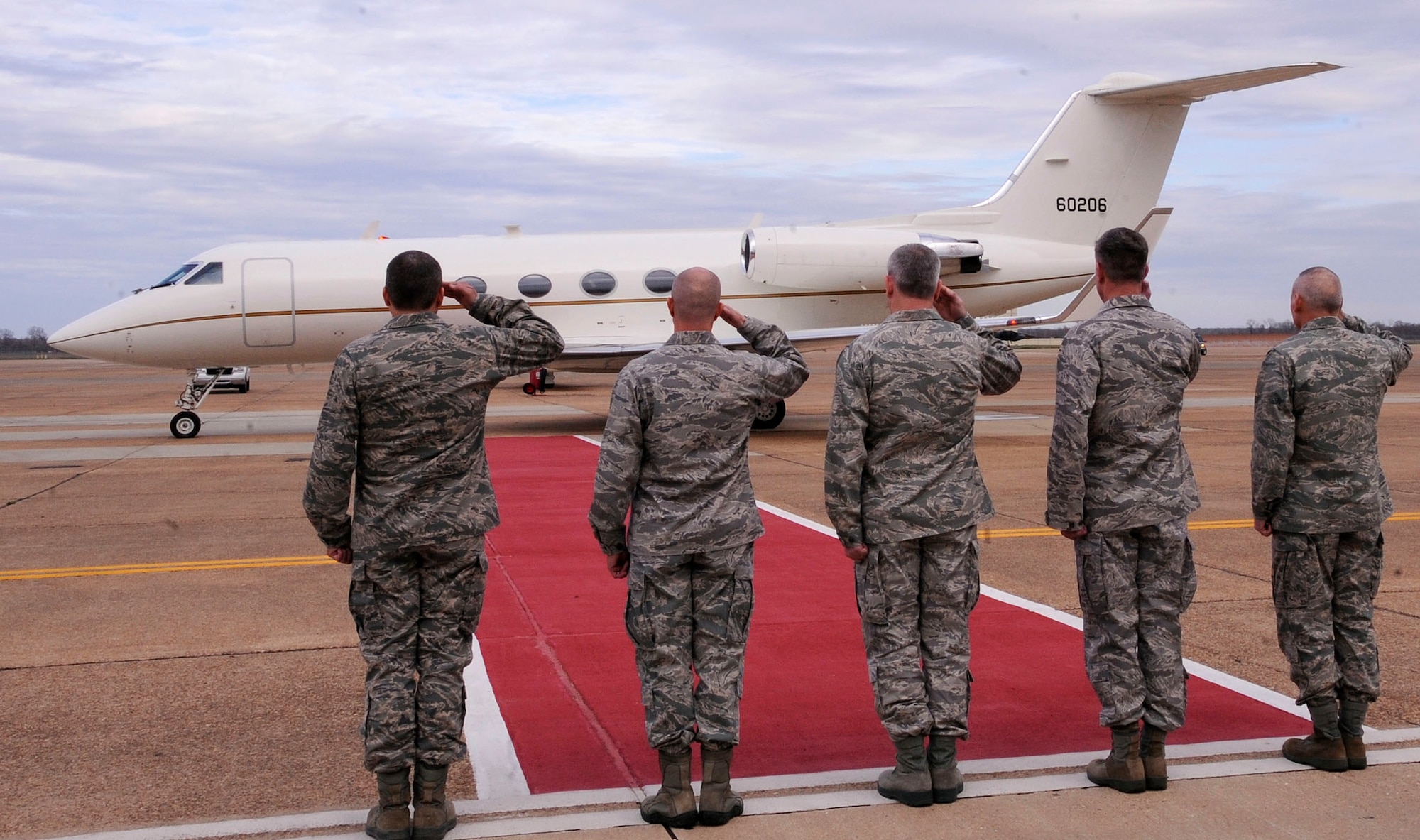Leadership of Team Barksdale salutes as Secretary of Defense Leon E. Panetta departs Barksdale Air Force Base, La., Feb. 17. The Secretary hosted an All-Call with more than 300 Airmen during his visit to thank them for their efforts in operating, maintaining and supporting the long range strike missions performed by the B-52H Stratofortress, B-2 Spirit and B-1B Lancer bomber aircraft. (U.S. Air Force photo/Senior Airman La'Shanette V. Garrett)(RELEASED)