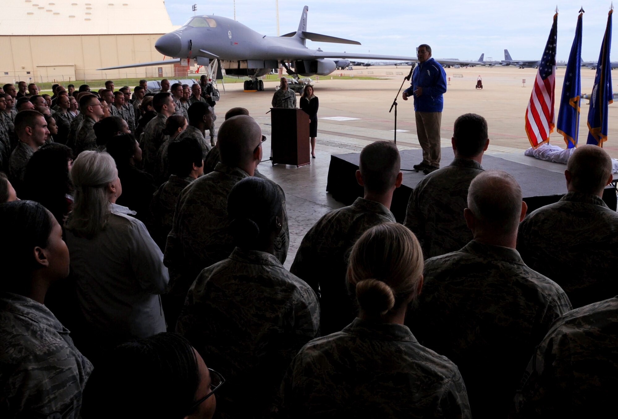 Secretary of Defense Leon E. Panetta addresses Air Force Airmen during a visit to Barksdale Air Force Base, La., Feb. 17. The Secretary hosted an All-Call with more than 300 Airmen to thank them for their efforts in operating, maintaining and supporting the long range strike missions performed by the B-52H Stratofortress, B-2 Spirit and B-1B Lancer bomber aircraft. During the event, Secretary Panetta also re-enlisted six Airmen and presented medals to Airmen who served in Afghanistan and other overseas locations.  Following the All-Call, Secretary Panetta met with Headquarters Air Force Global Strike Command and 2nd Bomb Wing leadership for briefings on global strike capabilities. (U.S. Air Force photo/Senior Airman La'Shanette V. Garrett)(RELEASED)