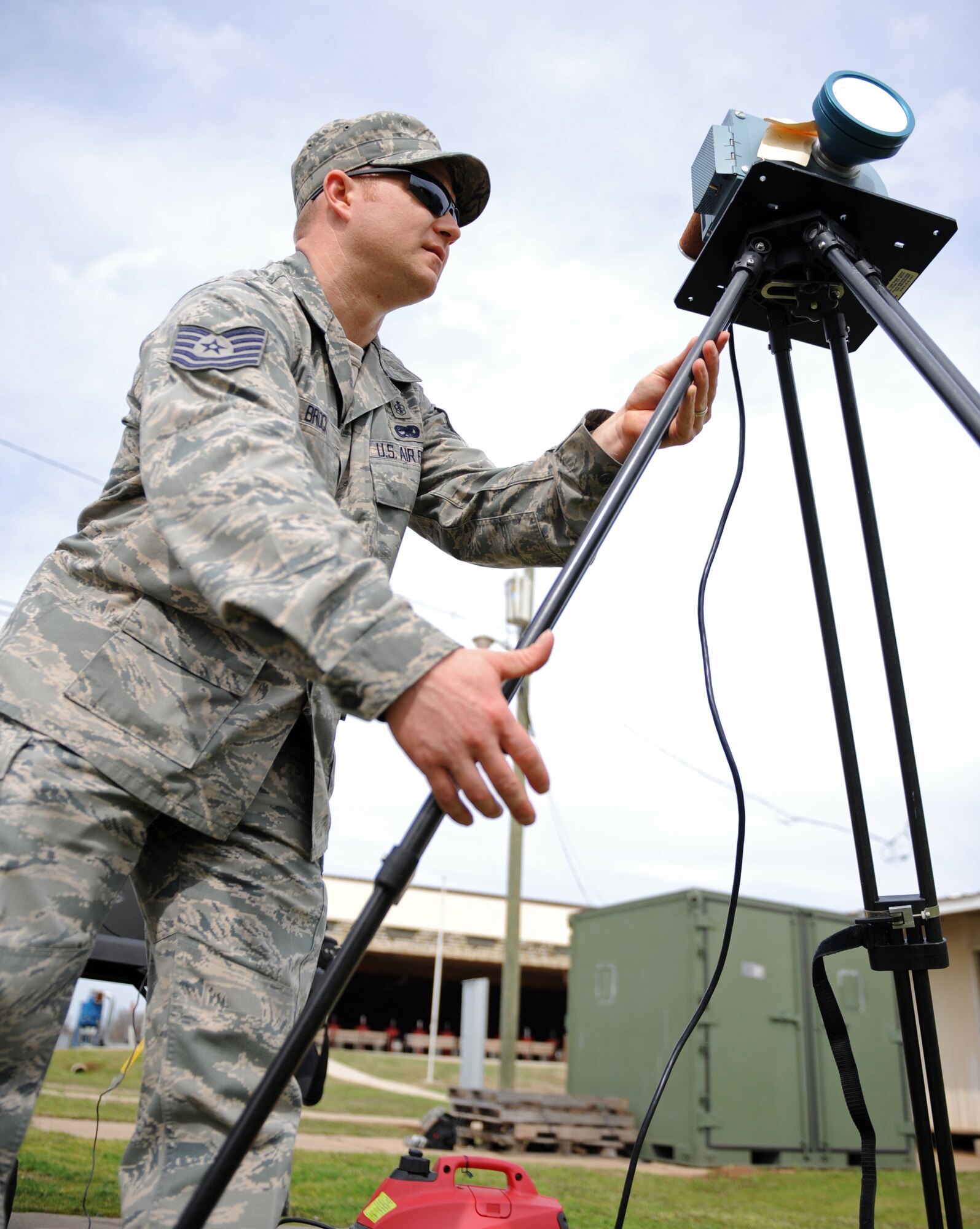 Tech. Sgt. Chad Brock, 2nd Aerospace Medicine Squadron, sets up a radiation detection device during an exercise on Barksdale Air Force Base, La., Feb. 16. Radiation devices are set up throughout decontamination zones to detect biological contaminants and monitor the flow of radiation in the area. (U.S. Air Force photo/Airman 1st Class Micaiah Anthony)(RELEASED)
