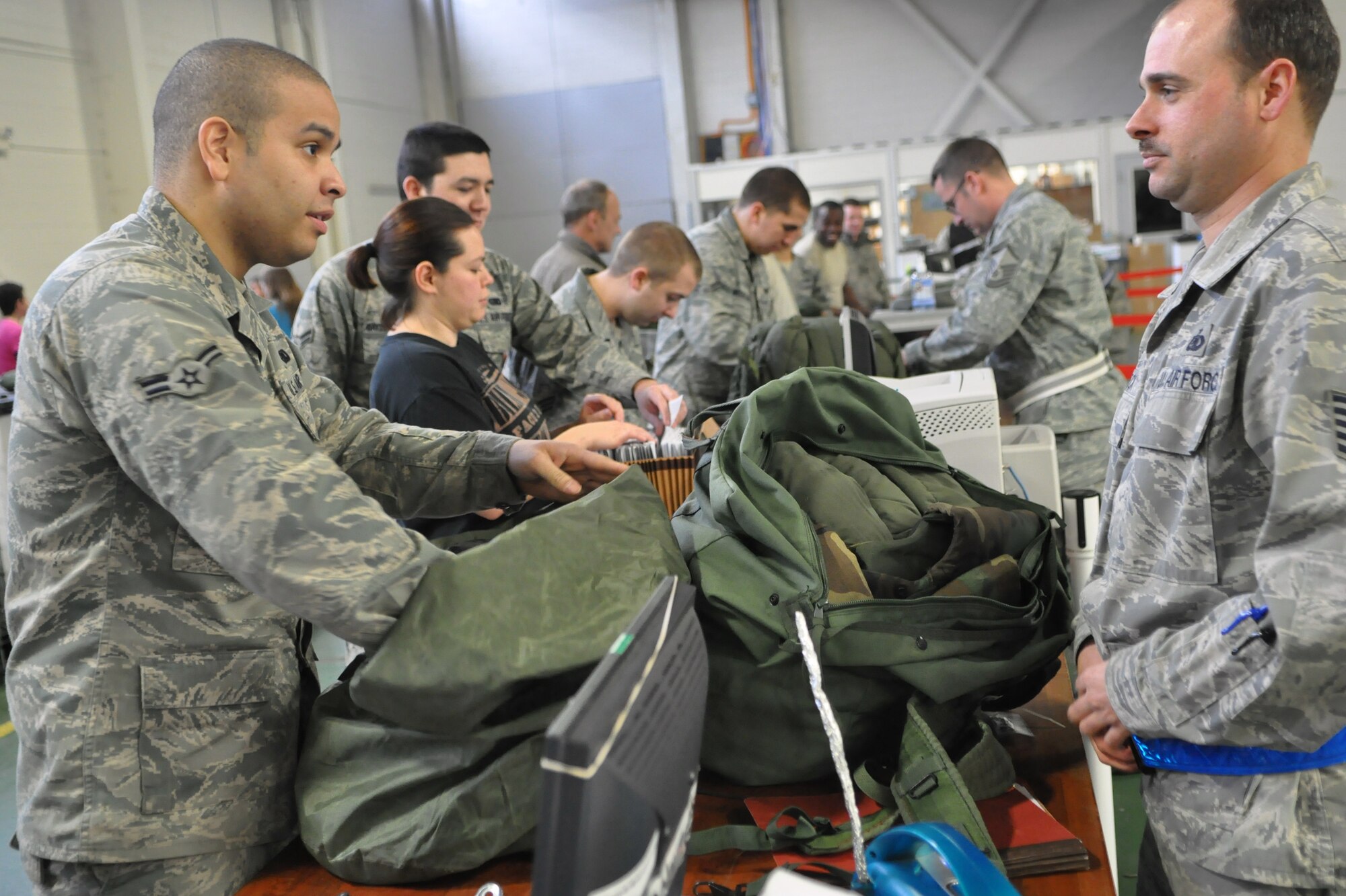 Airmen assigned to the 627th Logistic Readiness Squadron take inventory of equipment following a mobility exercise Feb. 17, 2012, at Joint Base Lewis-McChord, Wash. The team spent the week operating in a simulated deployed environment with a pause for training days in between.  (U.S. Air Force photo/Airman 1st Class Leah Young)