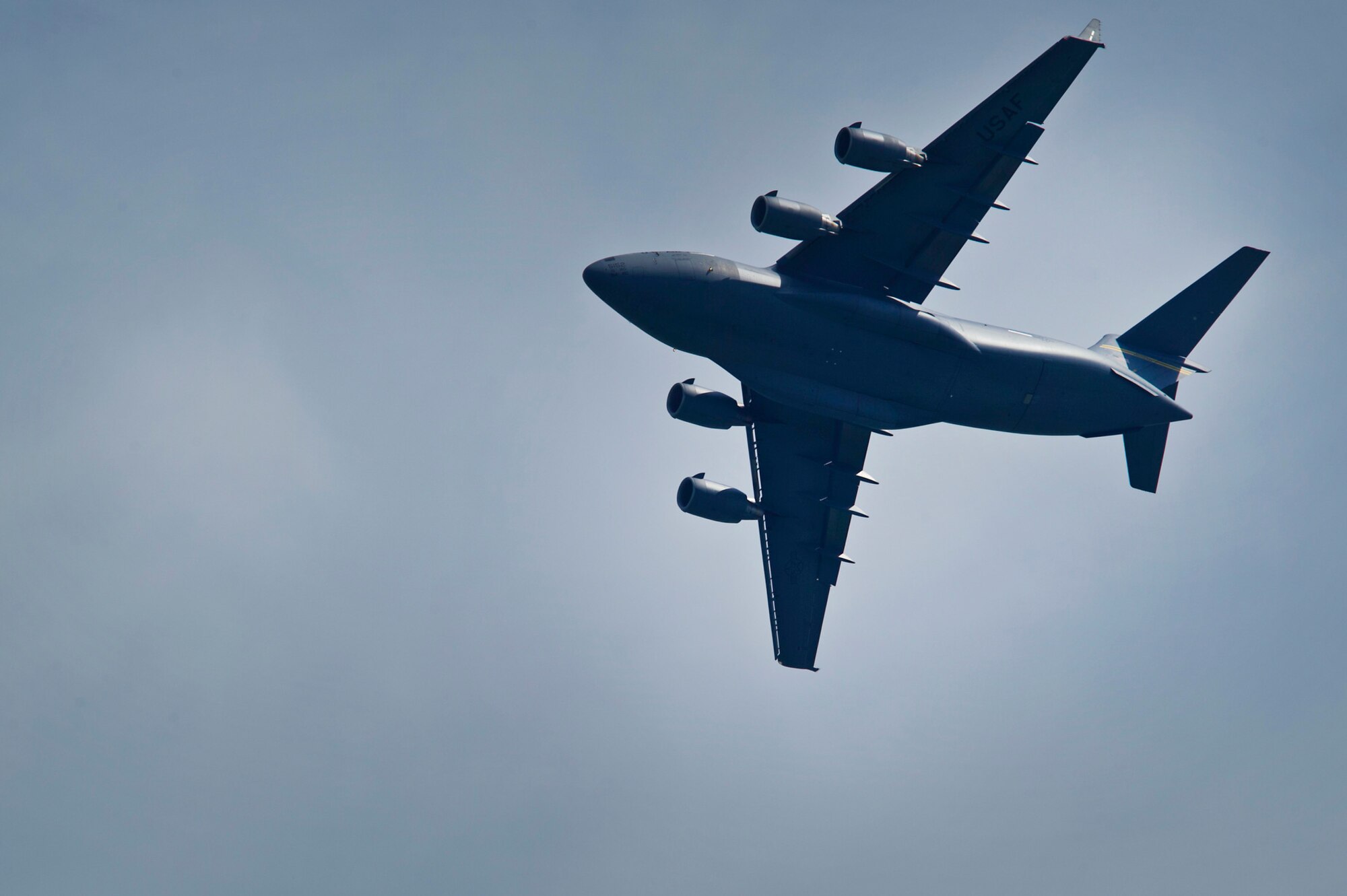 CHANGI, SINGAPORE -- A U.S. Air Force C-17 Globemaster III from the Pacific Air Forces (PACAF) Demonstration Team performs an aerial display during the 2012 Singapore Airshow on Feb. 15. The PACAF C-17 demo team is part of the 535th Airlift Squadron and is based out of Joint Base Pearl Harbor-Hickam, Hawaii. (Department of Defense photo by U.S. Air Force Tech. Sgt. Michael R. Holzworth/Released)