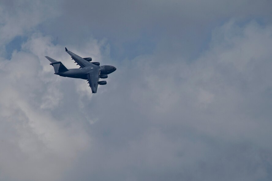 CHANGI, SINGAPORE -- A U.S. Air Force C-17 Globemaster III from the Pacific Air Forces (PACAF) Demonstration Team performs an aerial display during the 2012 Singapore Airshow on Feb. 15. The PACAF C-17 demo team is part of the 535th Airlift Squadron and is based out of Joint Base Pearl Harbor-Hickam, Hawaii. (Department of Defense photo by U.S. Air Force Tech. Sgt. Michael R. Holzworth/Released)