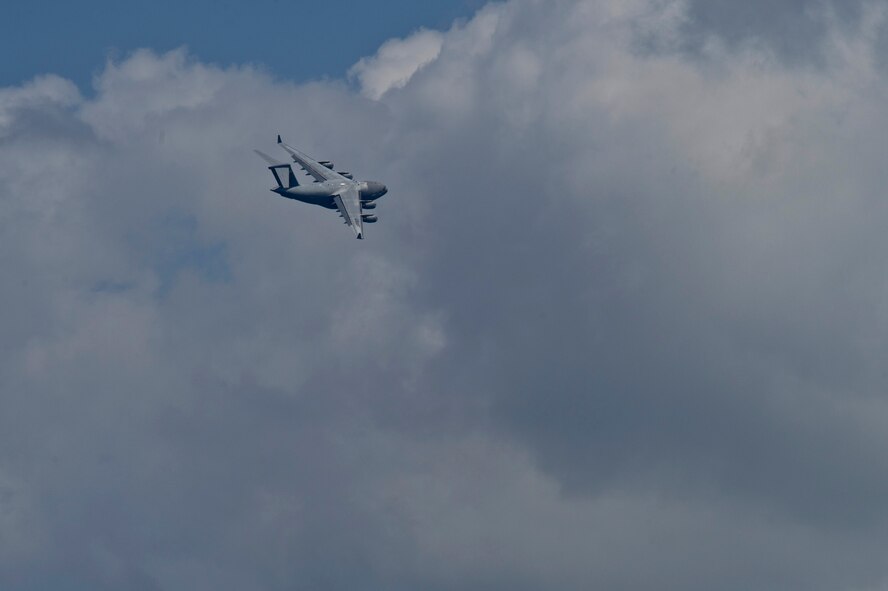CHANGI, SINGAPORE -- A U.S. Air Force C-17 Globemaster III from the Pacific Air Forces (PACAF) Demonstration Team performs an aerial display during the 2012 Singapore Airshow on Feb. 15. The PACAF C-17 demo team is part of the 535th Airlift Squadron and is based out of Joint Base Pearl Harbor-Hickam, Hawaii. (Department of Defense photo by U.S. Air Force Tech. Sgt. Michael R. Holzworth/Released)