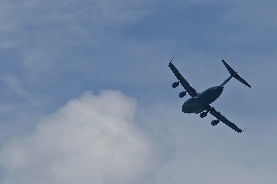 CHANGI, SINGAPORE -- A U.S. Air Force C-17 Globemaster III from the Pacific Air Forces (PACAF) Demonstration Team performs an aerial display during the 2012 Singapore Airshow on Feb. 15. The PACAF C-17 demo team is part of the 535th Airlift Squadron and is based out of Joint Base Pearl Harbor-Hickam, Hawaii. (Department of Defense photo by U.S. Air Force Tech. Sgt. Michael R. Holzworth/Released)