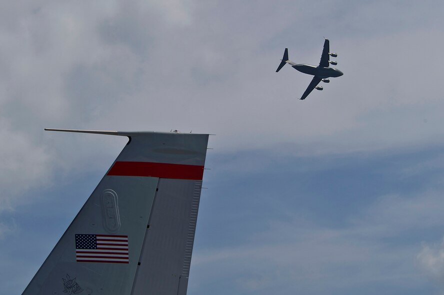 CHANGI, SINGAPORE -- A U.S. Air Force C-17 Globemaster III from the Pacific Air Forces (PACAF) Demonstration Team performs an aerial display during the 2012 Singapore Airshow on Feb. 15. The PACAF C-17 demo team is part of the 535th Airlift Squadron and is based out of Joint Base Pearl Harbor-Hickam, Hawaii. (Department of Defense photo by U.S. Air Force Tech. Sgt. Michael R. Holzworth/Released)
