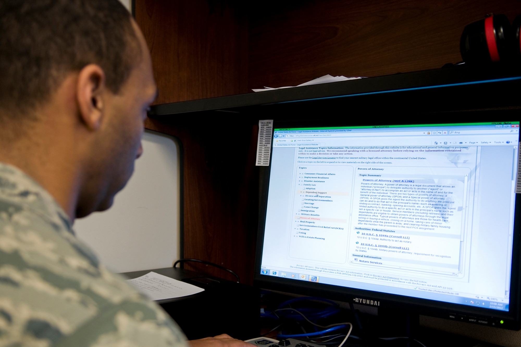 GRISSOM AIR RESERVE BASE, Ind. -- Senior Airman Ryan Reese reads about powers of attorney on the Air Force legal assistance website here Jan. 15. The website is a resource that provides servicemembers, retirees and their dependents basic information on legal assistance topics that commonly affect military members such as consumer affairs, family law, wills and powers of attorney. Reese is an aircraft fuel systems technician with the 434th Maintenance Squadron. (U.S. Air Force photo/Tech. Sgt. Mark R. W. Orders-Woempner) 
