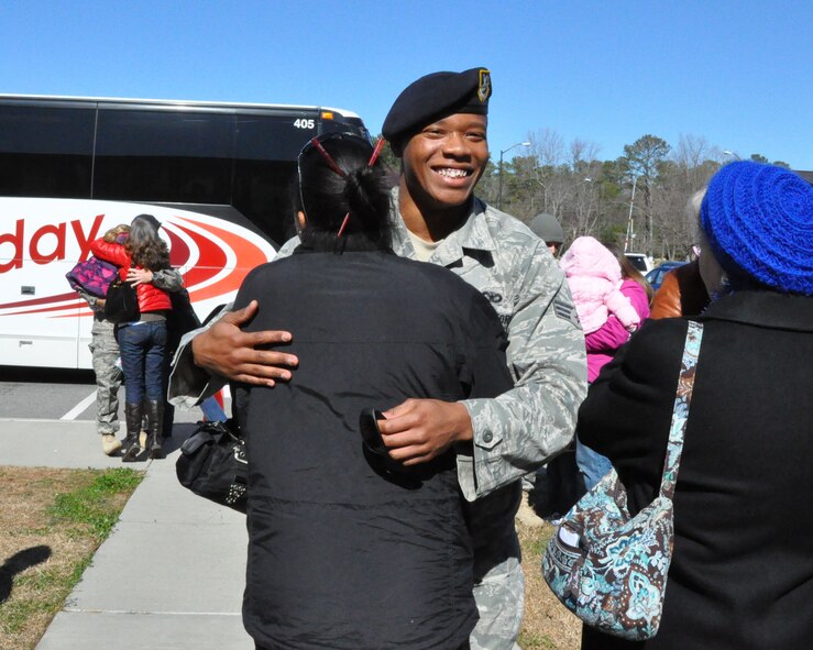 Senior Airman Clifton D. Howard, 916th Security Forces Squadron, is welcomed back to Seymour Johnson by friends and family on Feb. 12, 2012, after a six-month deployment to Afghanistan in support of Operation Enduring Freedom. (USAF photo by MSgt. Wendy Lopedote, 916ARW/PA)

 

