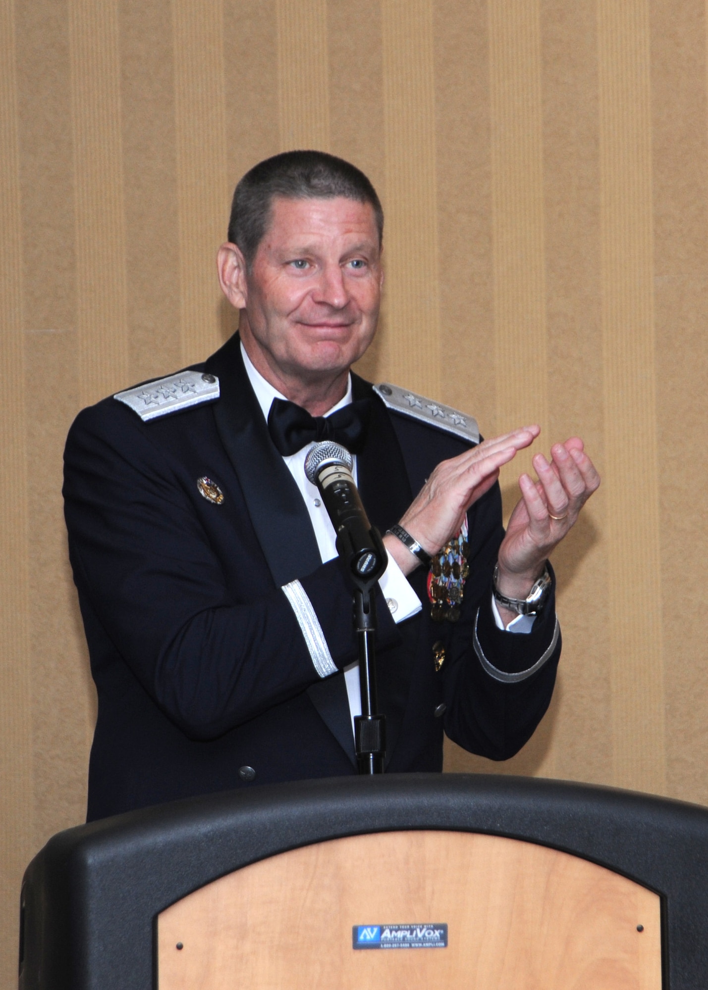 U.S. Air Force Gen. Robin Rand, 12th Air Force Commander, gives a speech during the 12th Air Force Outstanding Performer of the Year Banquet at Davis-Monthan Air Force Base, Ariz., Feb 13, 2012. The OPY Banquet recognized 12th Air Force’s most outstanding performers. (U.S. air force photo by Airman 1st Class Camilla Griffin/Released)