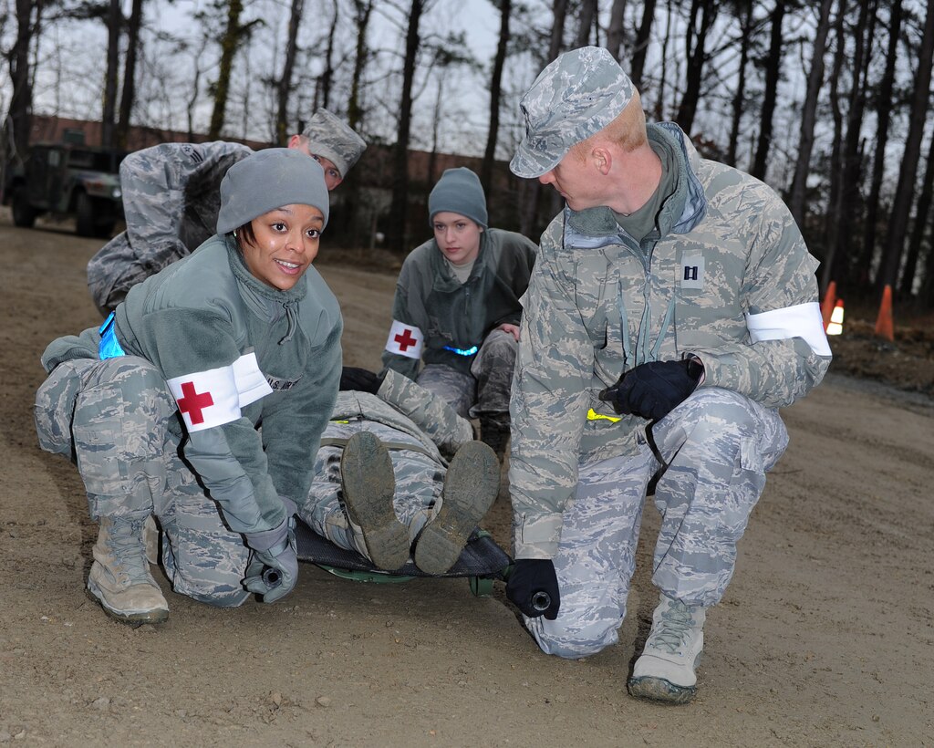 Airmen from the 633rd Medical Group Ambulance Team practice self-aid buddy care during the phase II operational readiness exercise at Langley Air Force Base, Va., Feb. 14, 2012. The three-day exercise covered a wide variety of scenarios, including missile attacks and injured Airmen. (U.S. Air Force photo by Airman 1st Class Teresa Cleveland/Released)