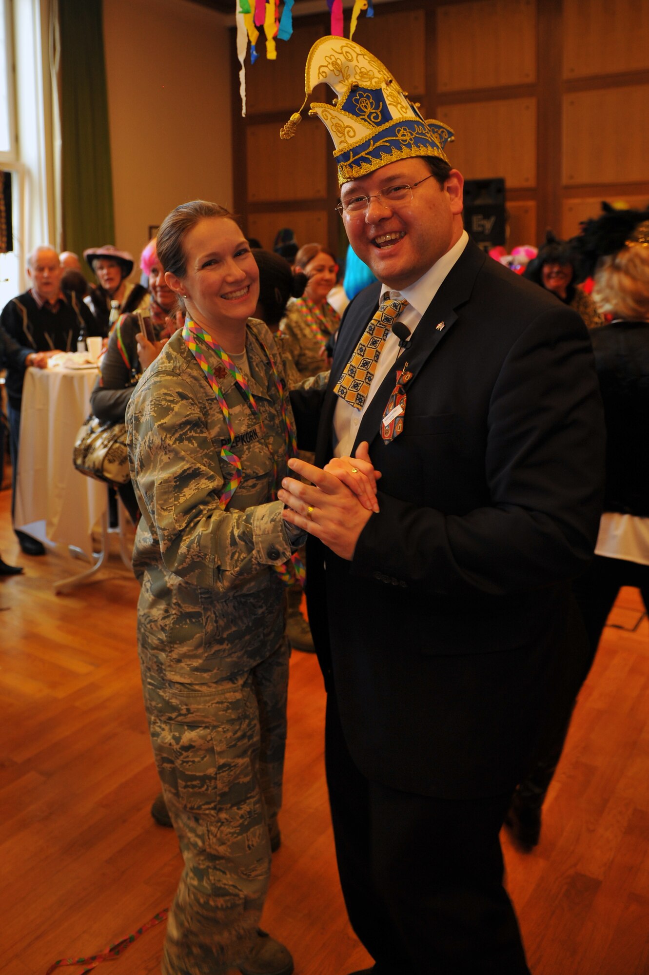 BITBURG, Germany – Maj. Julianna Piepkorn, 52nd Force Support Squadron individual mobility augmentee operations officer, dances with Joachim Kandels, Bitburg mayor, during Ladies Fasching Day celebrations at the Bitburg Town Hall here Feb. 16. Ladies Fasching Day is a German celebration where women “take over” the city for the day. Once the ladies have “taken over” the city hall, the celebrations begin with dancing and parading throughout the city. The traditional Fasching celebrations begin the Thursday prior to Lent at the 11th minute past the 11th hour, continue until Ash Wednesday and allow people to indulge before the Lent season. (U.S. Air Force photo by Airman 1st Class Dillon Davis/Released)