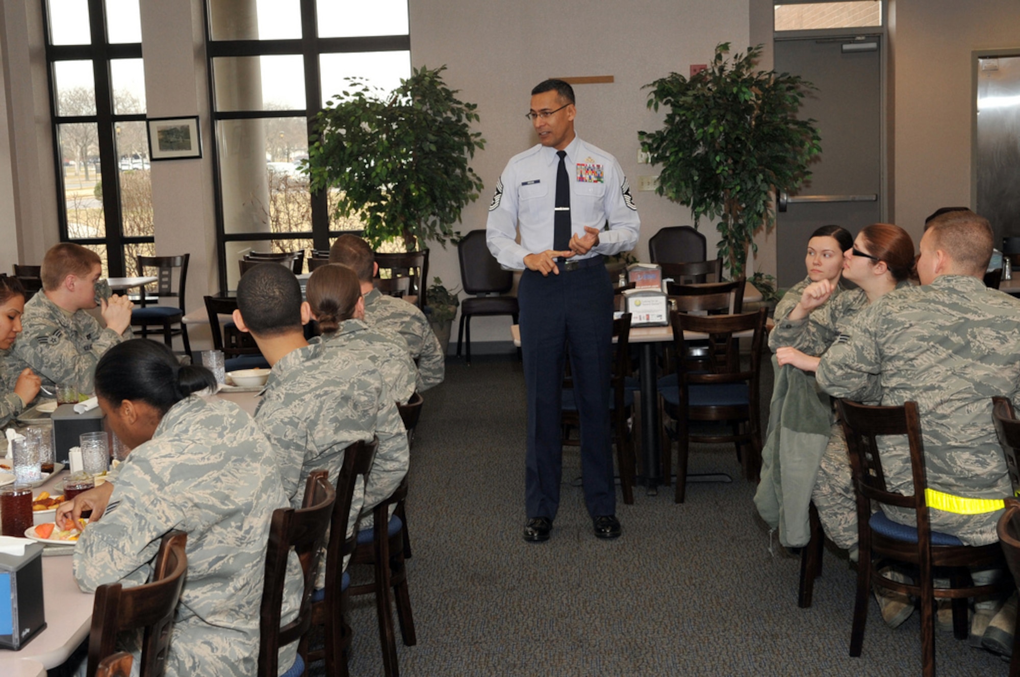Chief Master Sgt. Terrence Greene, 87th Air Base Wing command chief, has an open question and answer lunch with various Airmen, representing the different squadrons that make up the 87th ABW on Feb. 14 at the Halverson Hall Dining Facility. (U.S. Air Force photo by Wayne Russell/Released) 