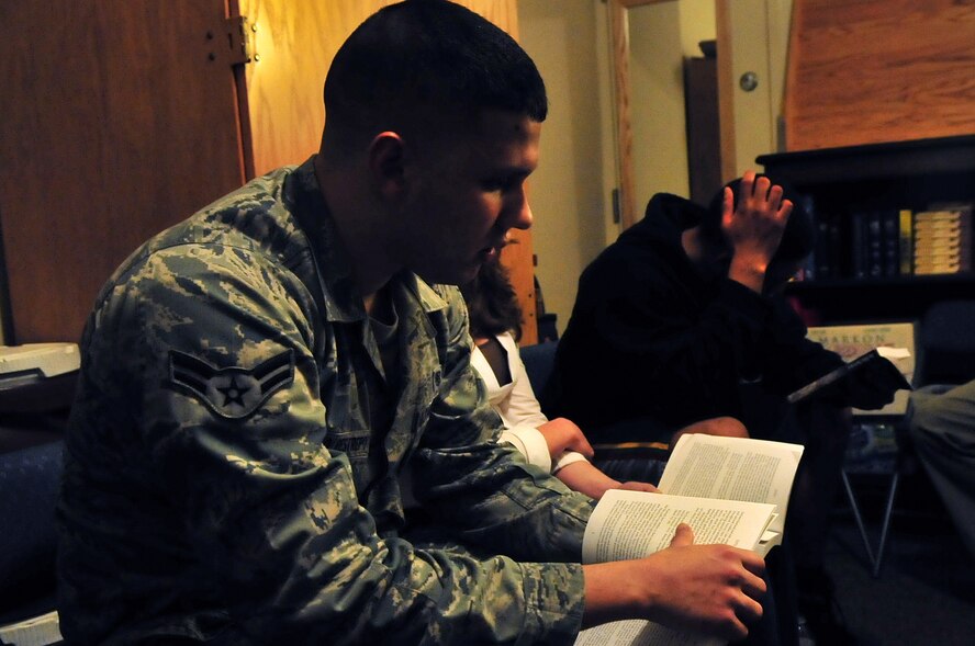 U.S. Air Force Airman 1st Class Andres Orozco, 20th Medical Support Squadron, reads during a chaplain study group, Shaw Air Force Base, S.C.Feb.16, 2011.This was the first official group meeting held this year. The meetings are designed for Airmen to discuss their military experiences as well as religious testimonies. (U.S. Air Force photo by Airman 1st Class Ashley L. Gardner/ Released)