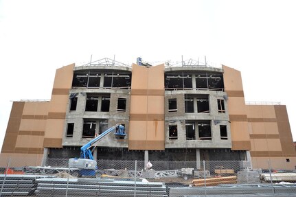 Construction of the new Airman Training Complex No. 1 and its dining-classroom facility continues. The complex is on pace to be finished by late summer. Eventually, four ATCs and two dining-classroom facilities will replace eight Recruit Housing and Training buildings built in the late 1960s and early 1970s. Each new ATC will house up to 1,200 basic trainees. (U.S. Air Force photo/Alan Boedeker)